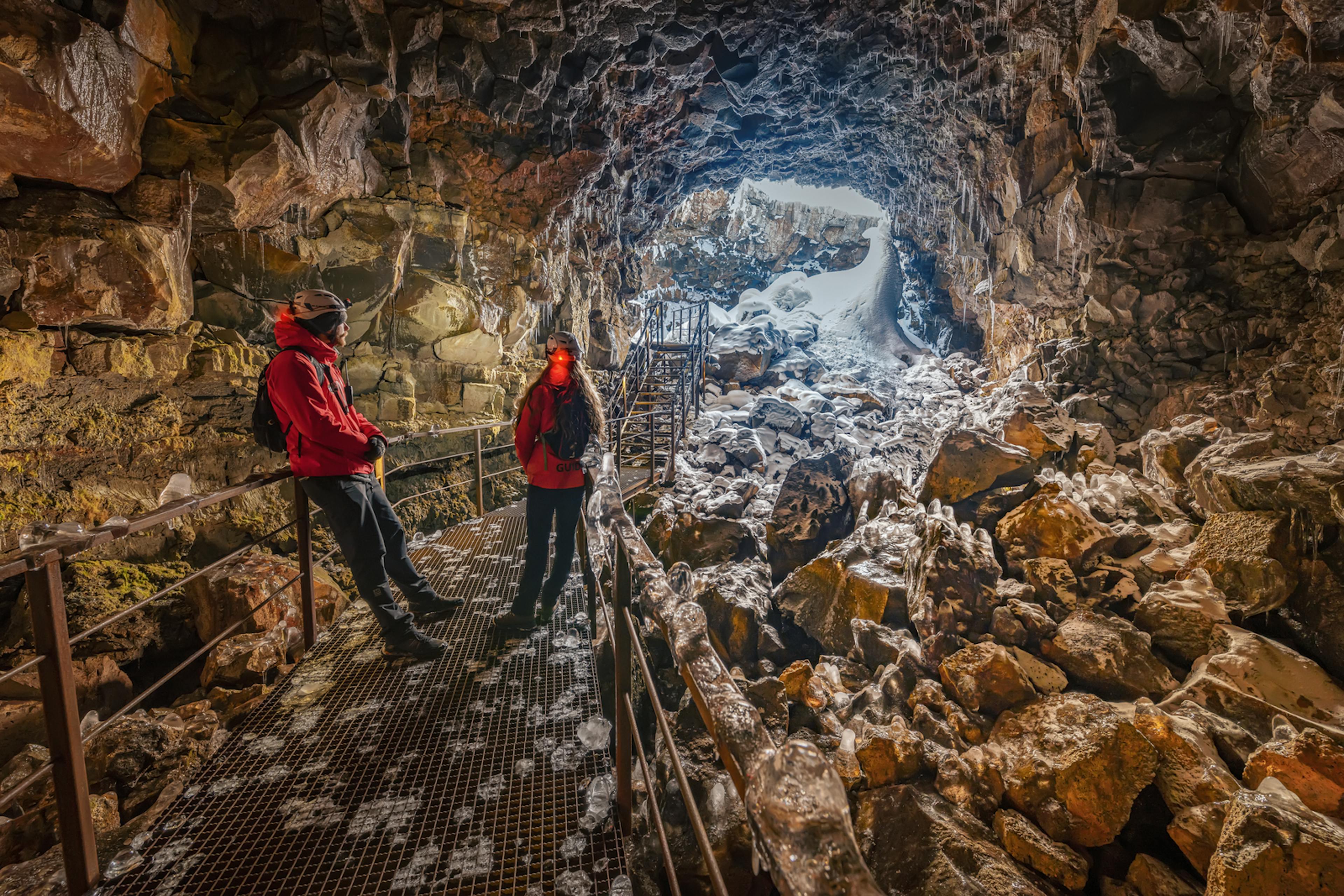 Tourists in a magma chamber in Iceland