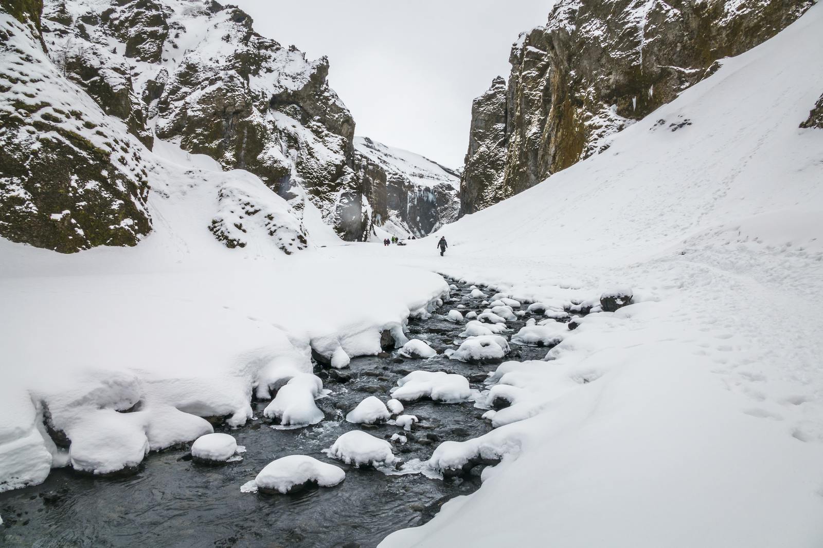 Þórsmörk covered in snow with a river