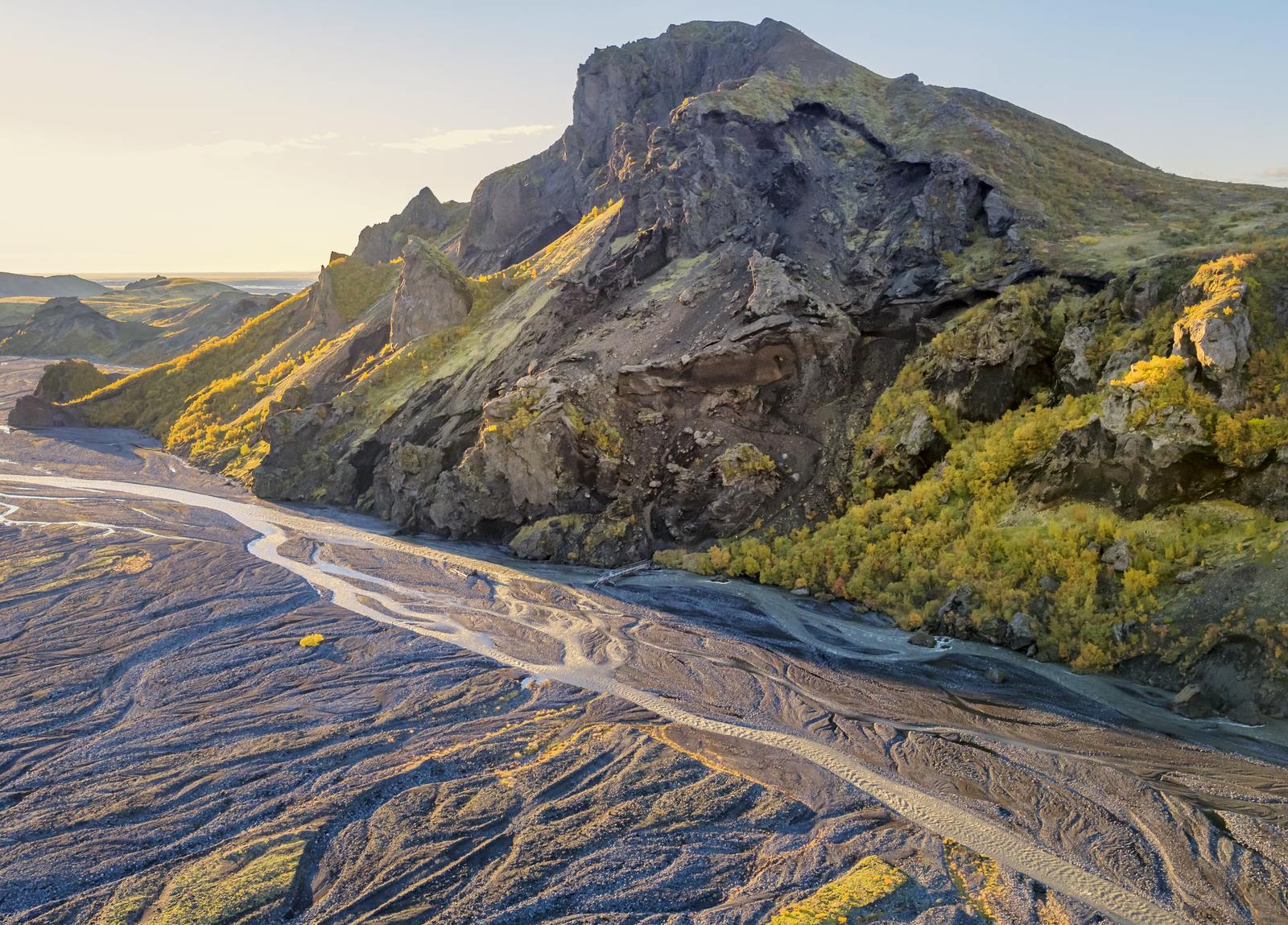 a mountain in þorsmörk by a river in Iceland's Central Highlands