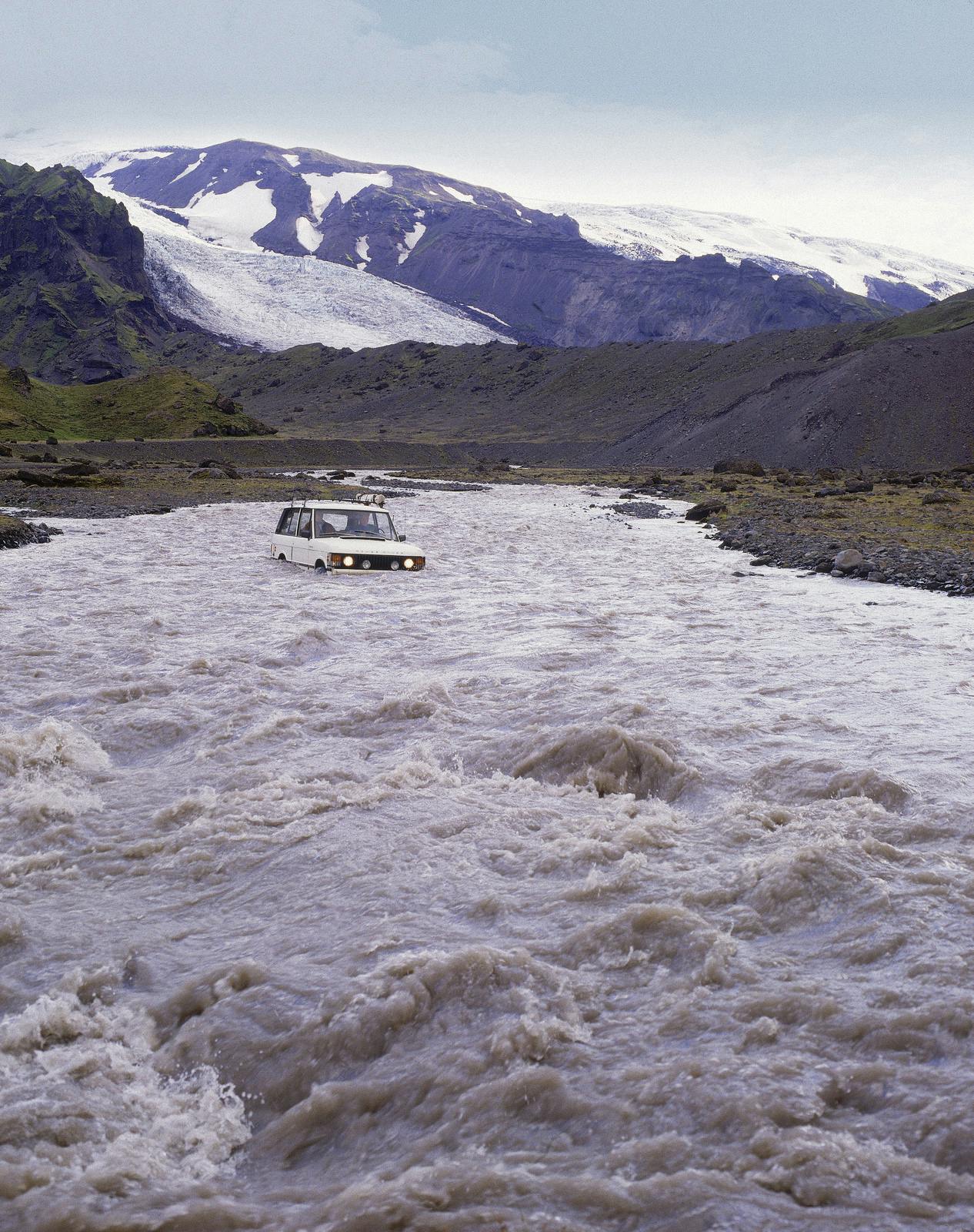 a jeep deep in the river in Thorsmork
