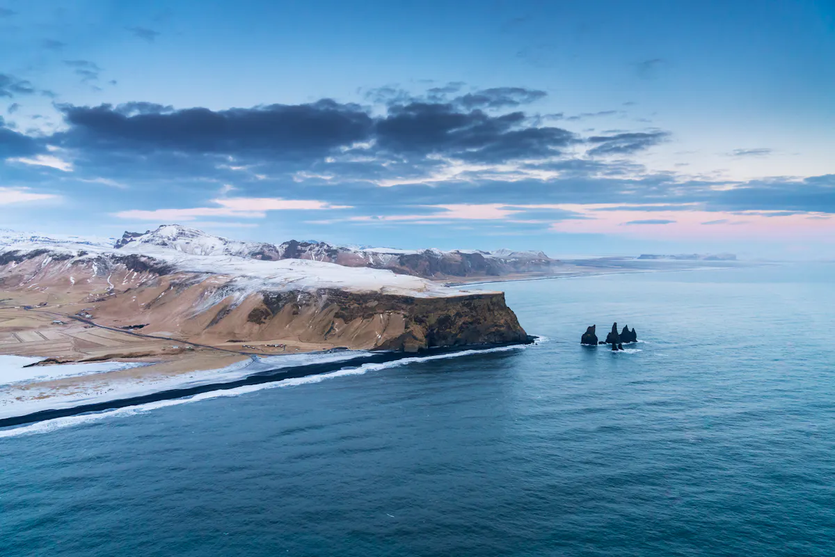 Reynisfjara Beach | The Most Famous Black Sand Beach in Iceland | Perlan