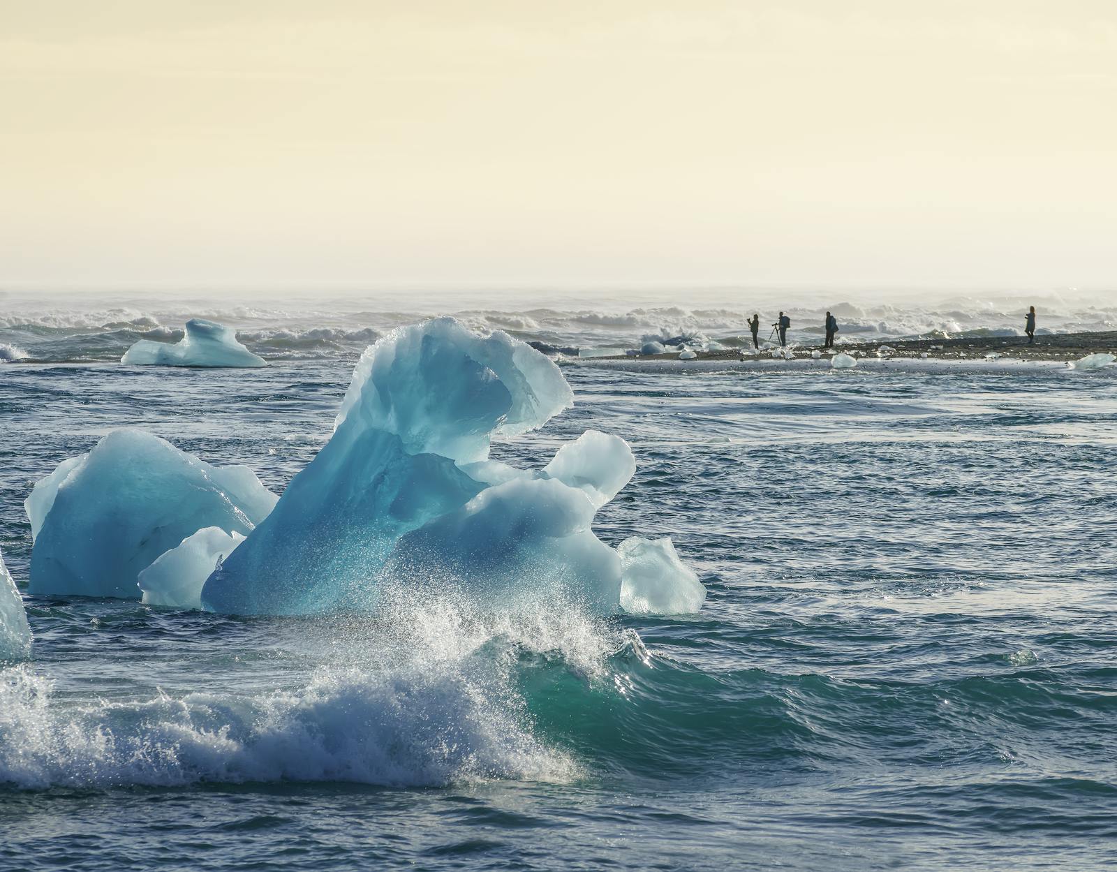 an iceberg in the ocean by diamond beach