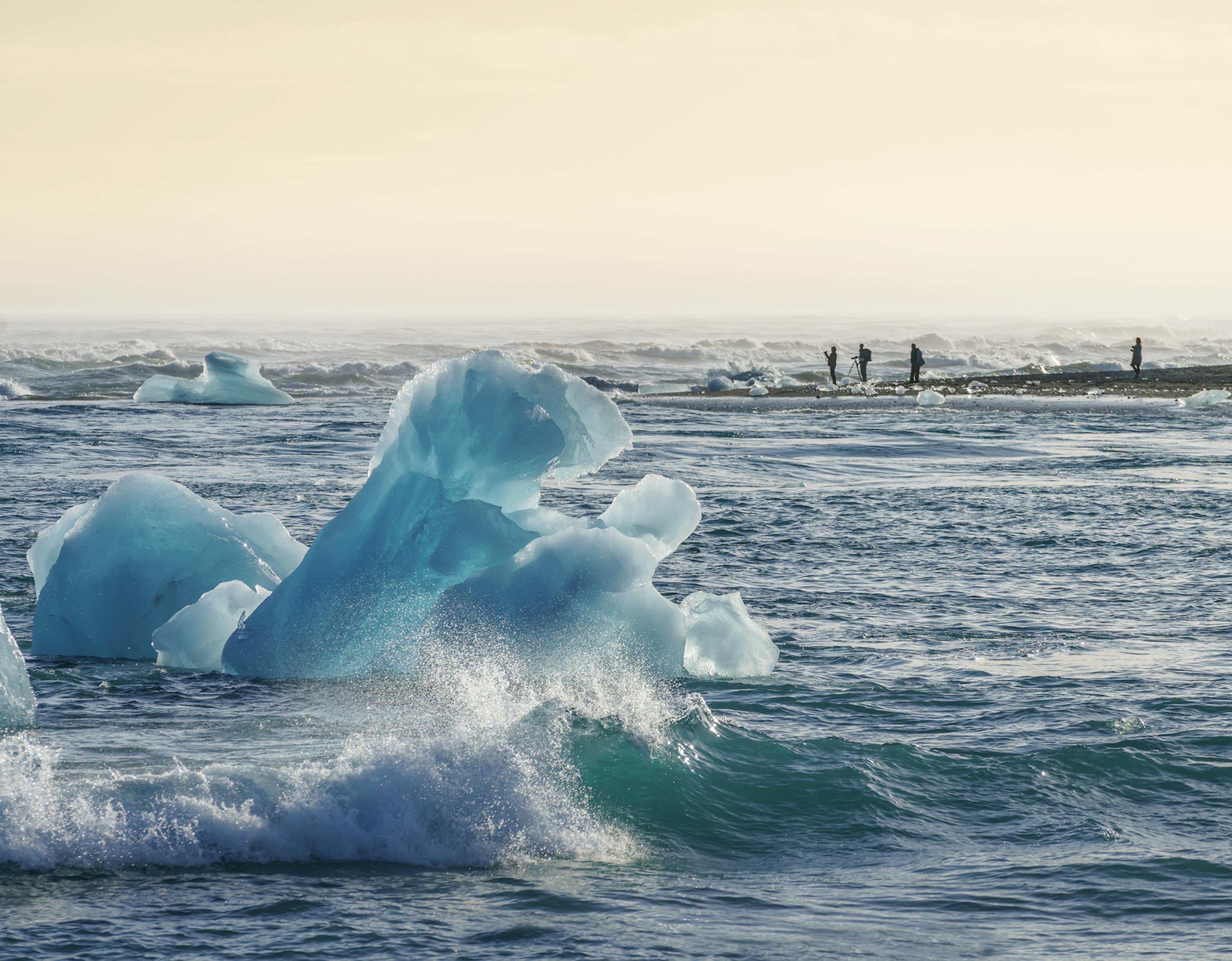 an iceberg in the ocean by diamond beach