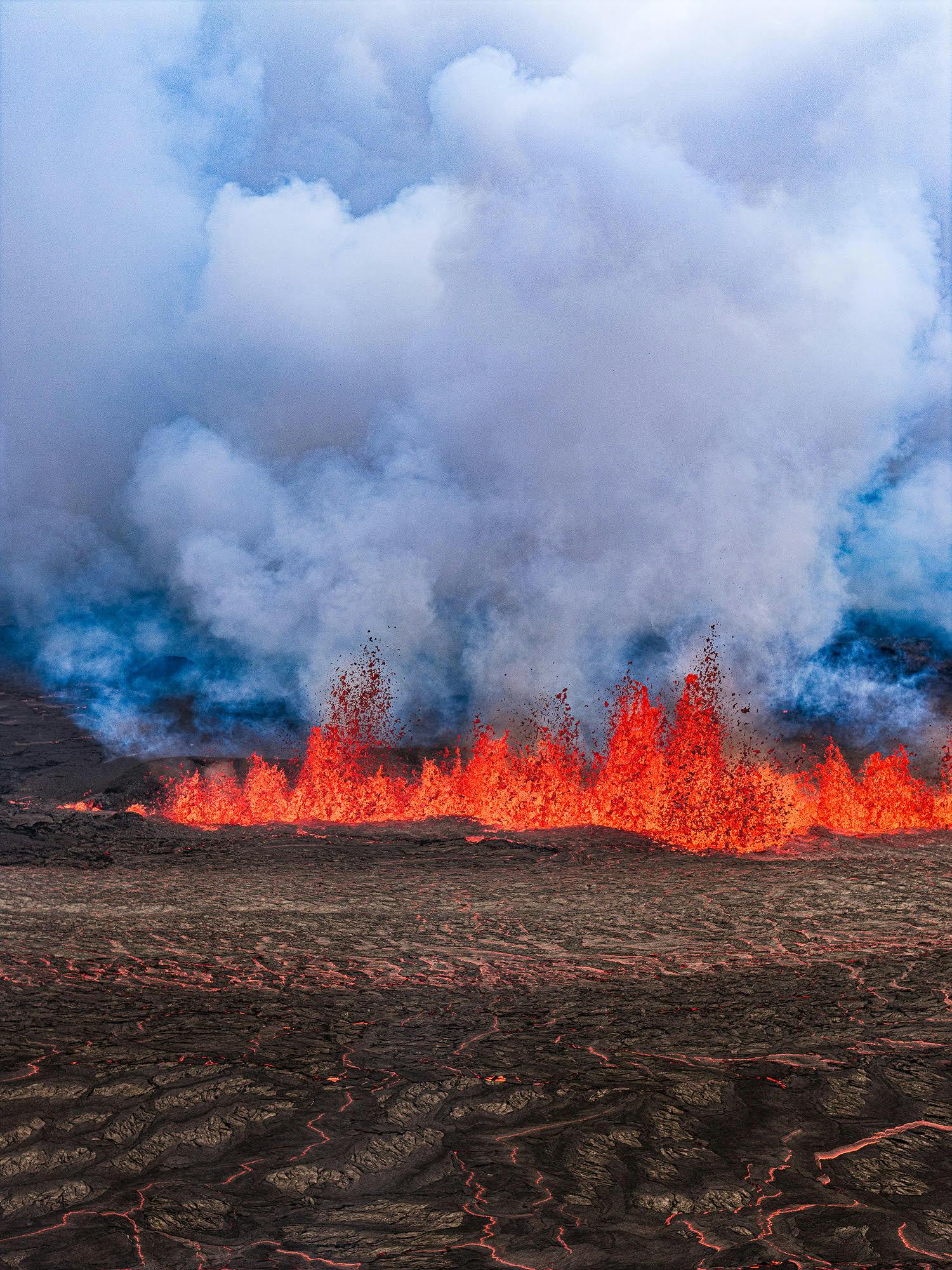 a close up of the lava spewing up from sundhnuka crater row eruption