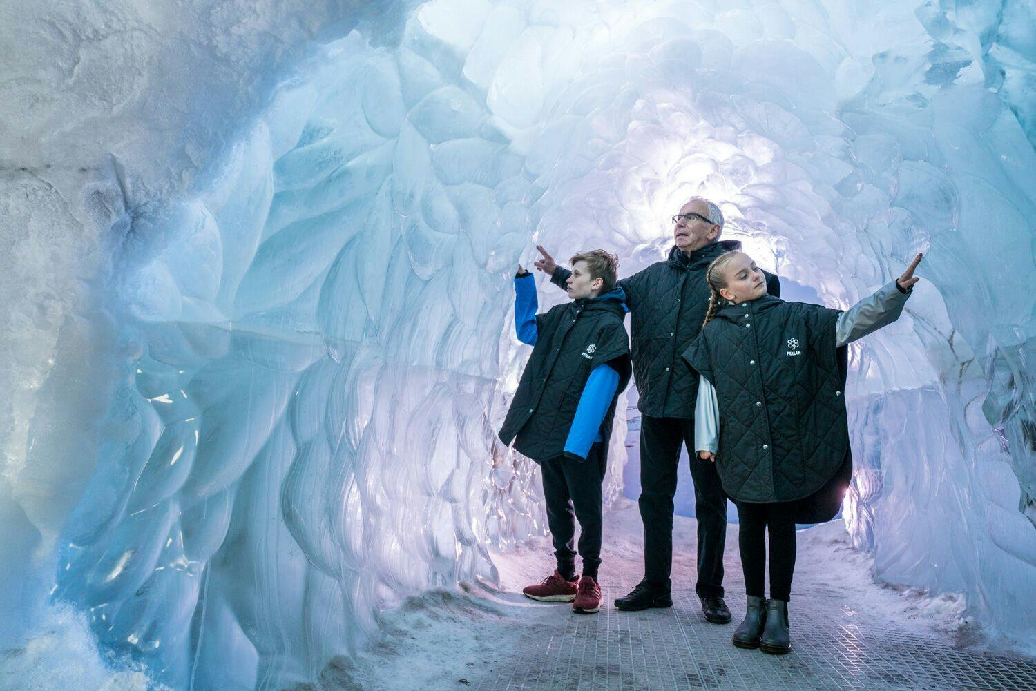 A family visiting the ice cave in Reykjavík