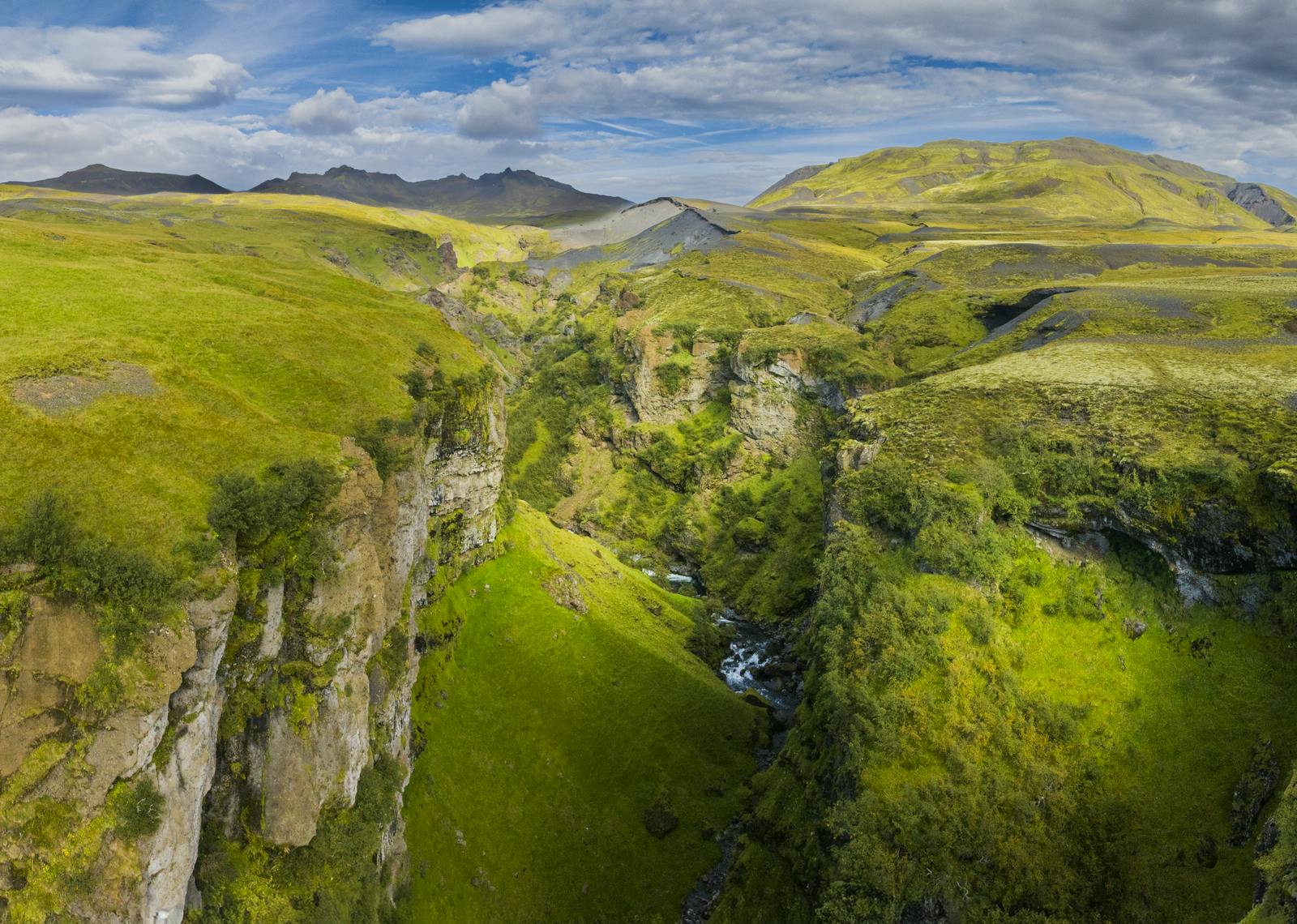 the gap in þórólfsfell in the greenery of the summer