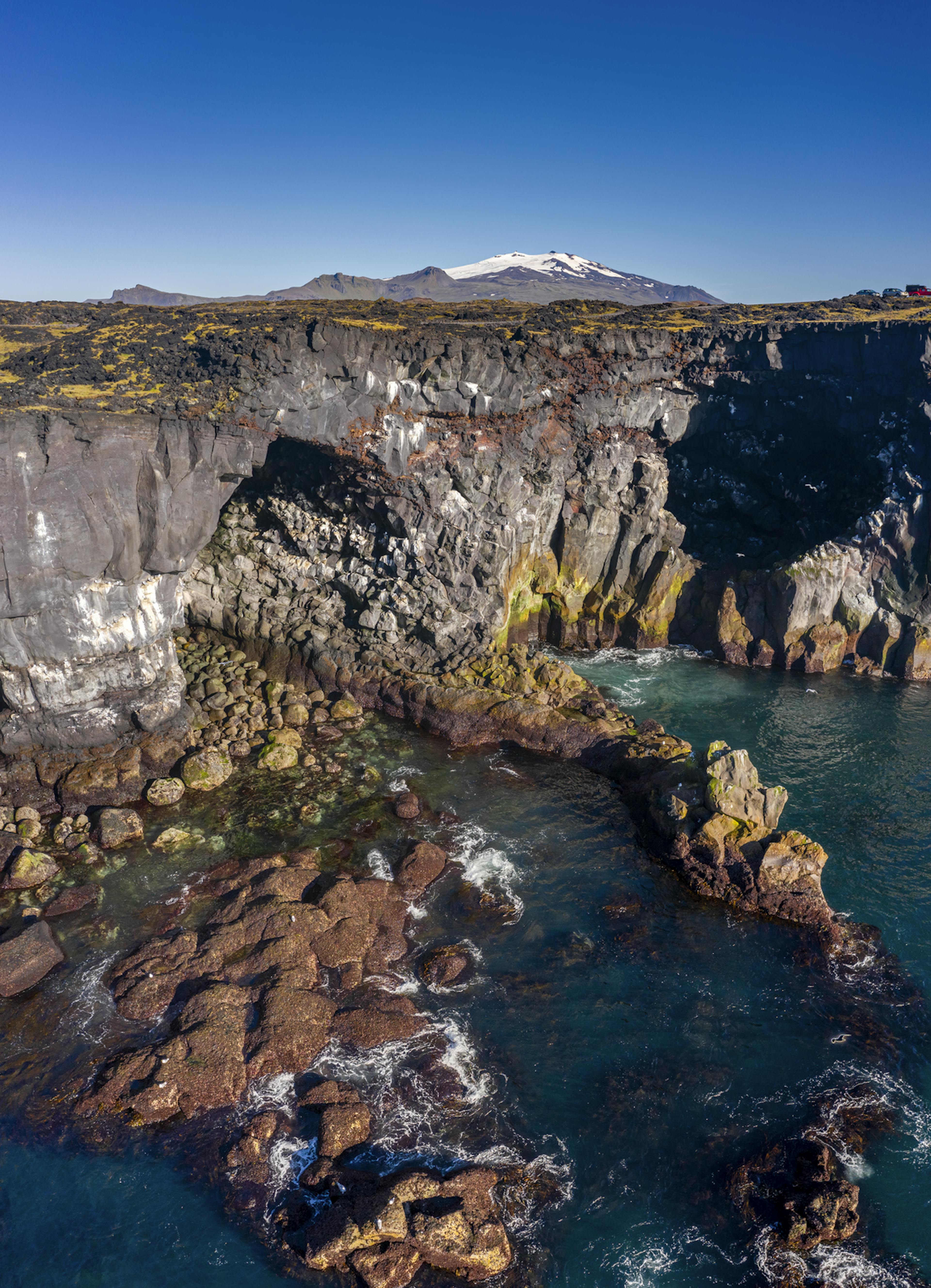 Gerðuberg Cliffs by the sea on a sunny dag