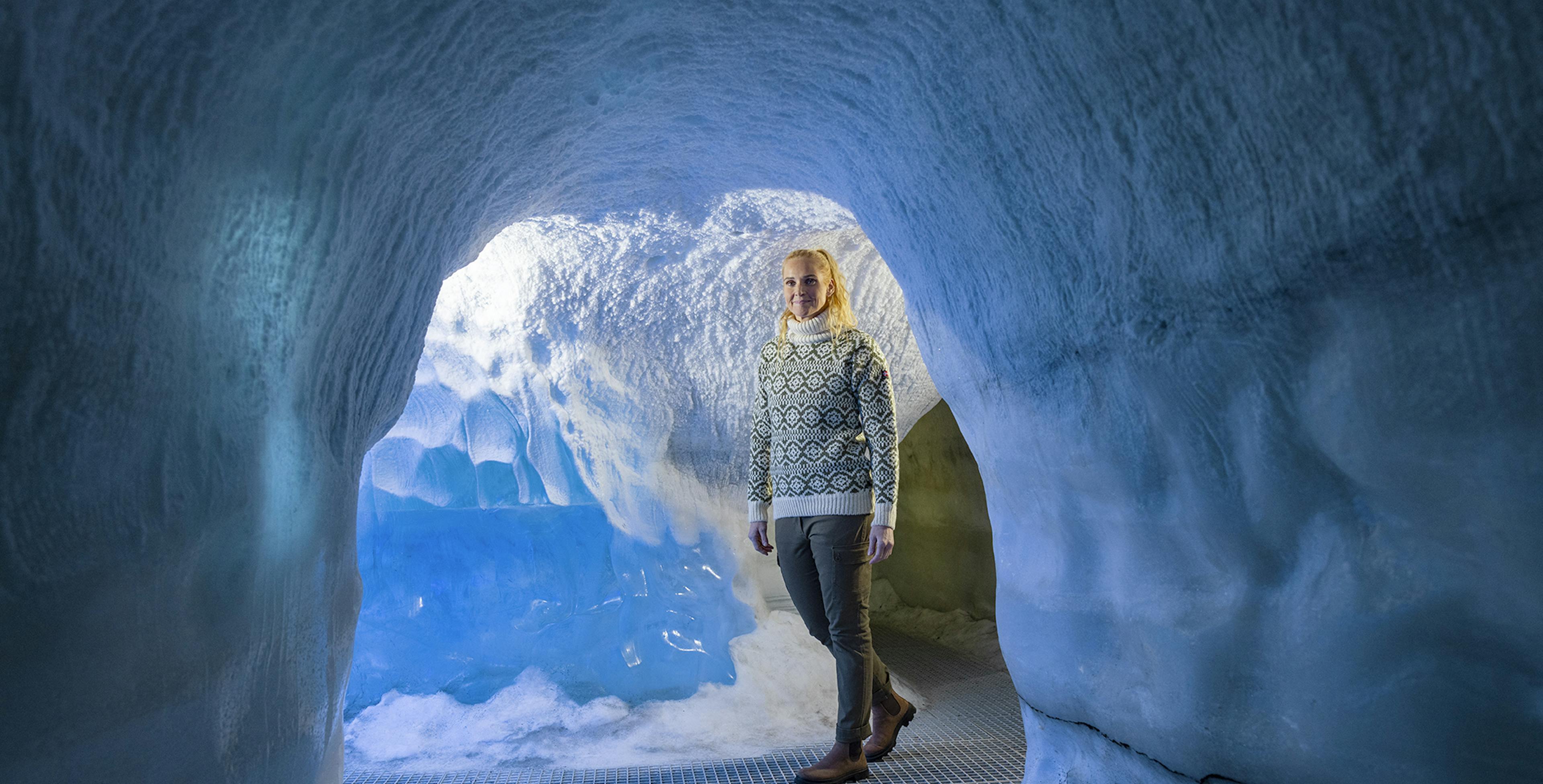 Woman in ice cave exhibit