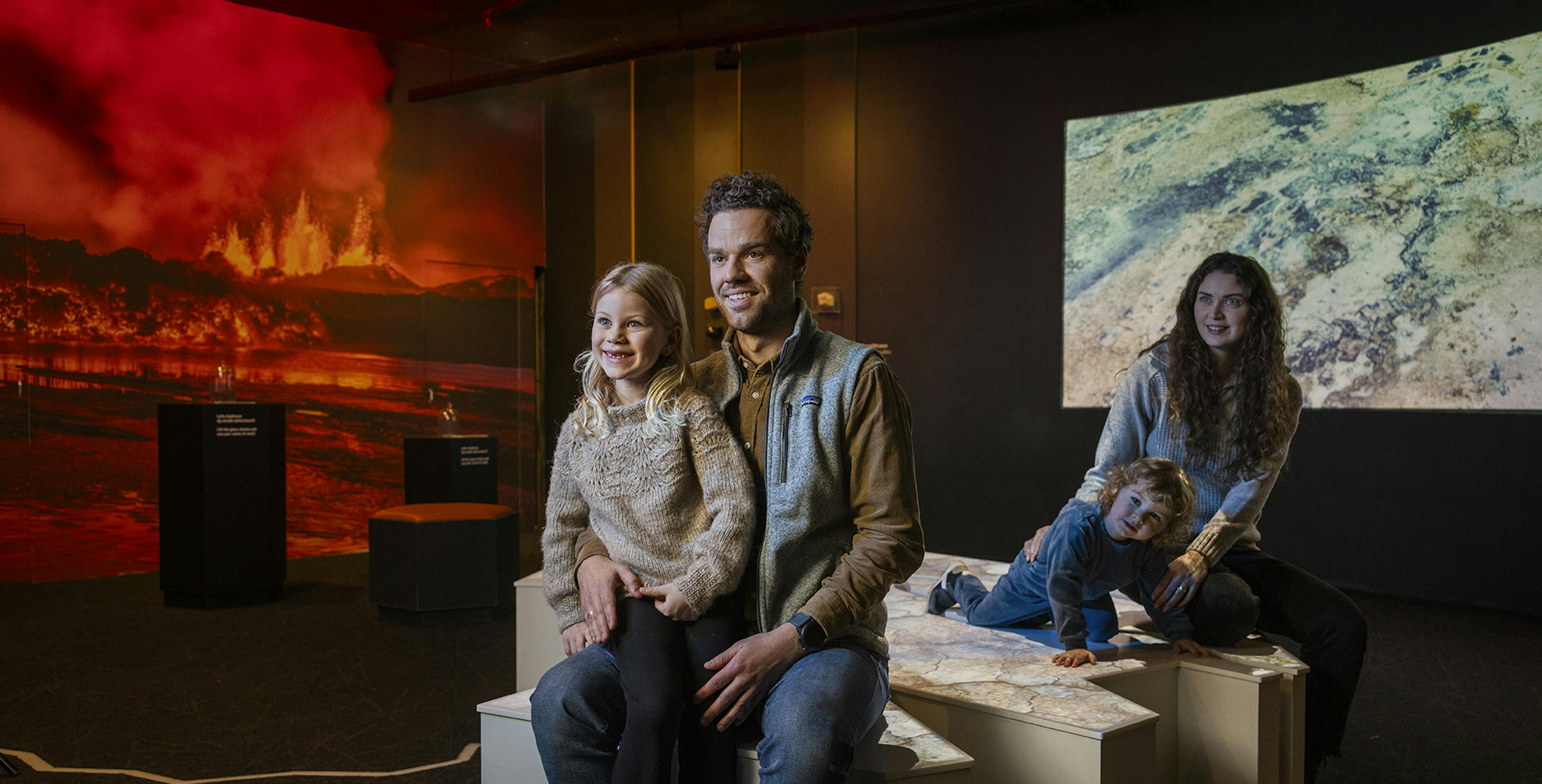 Family experiencing the volcano exhibit