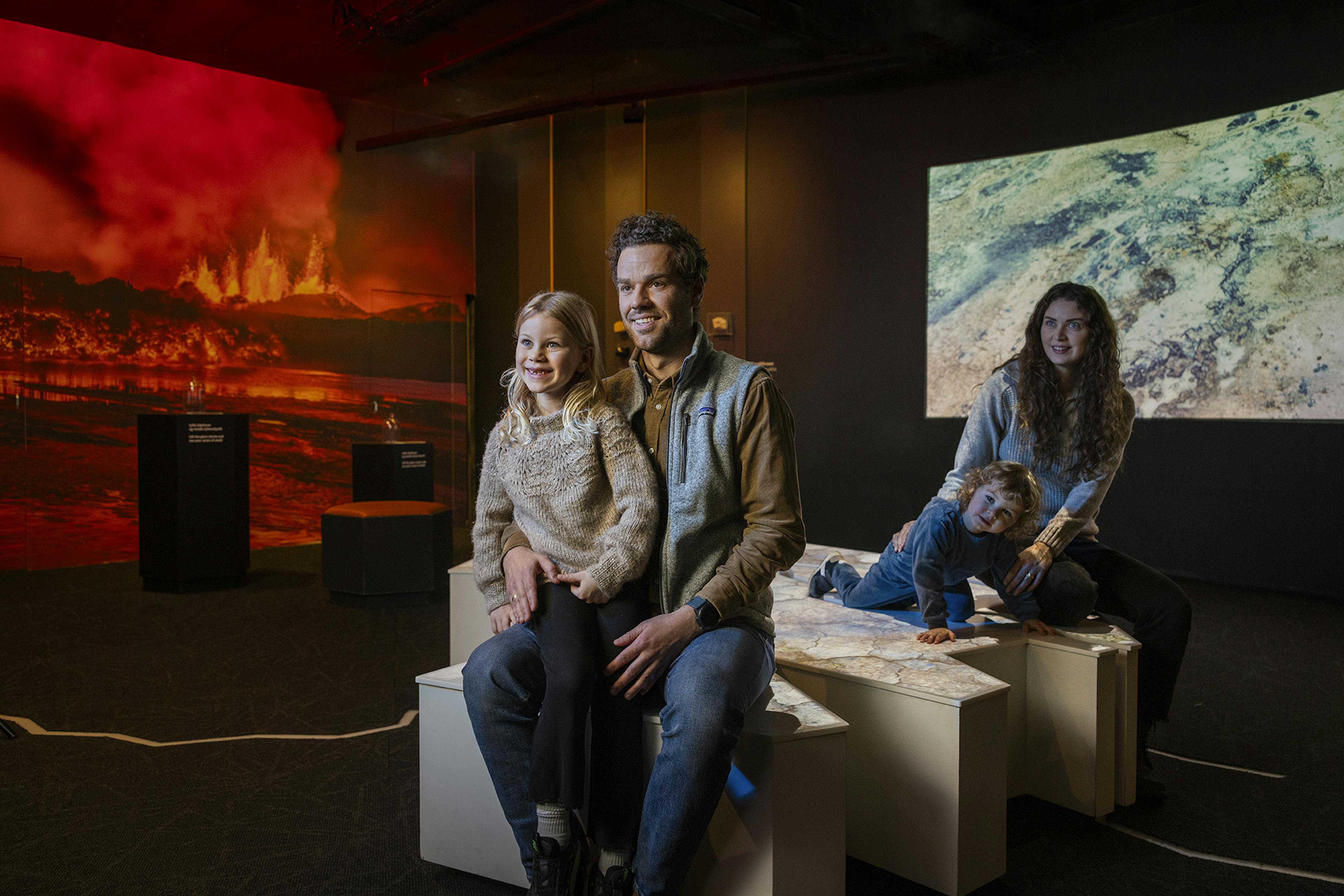 Family experiencing the volcano exhibit