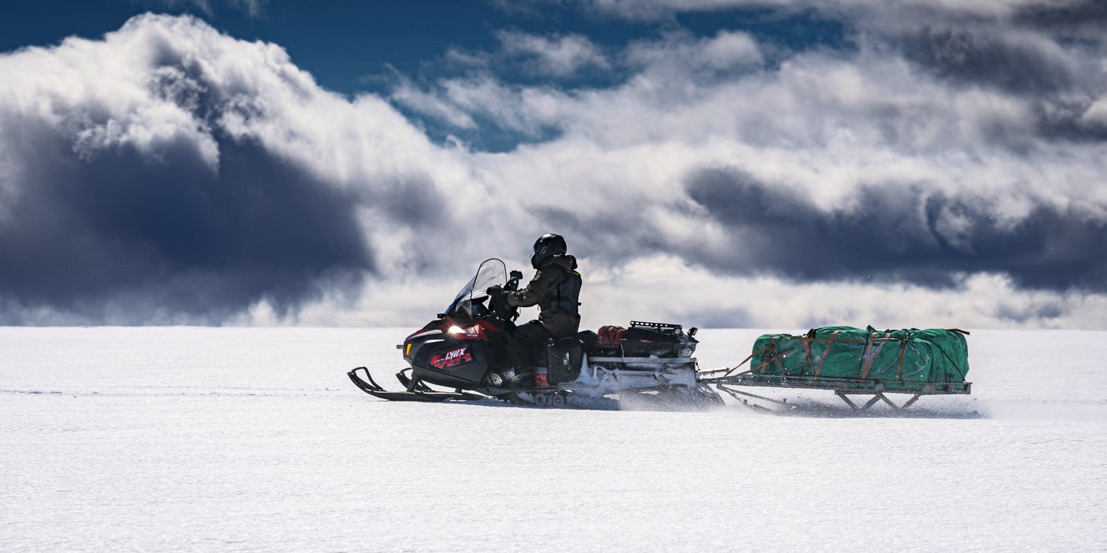Snowmobile trip on a glacier