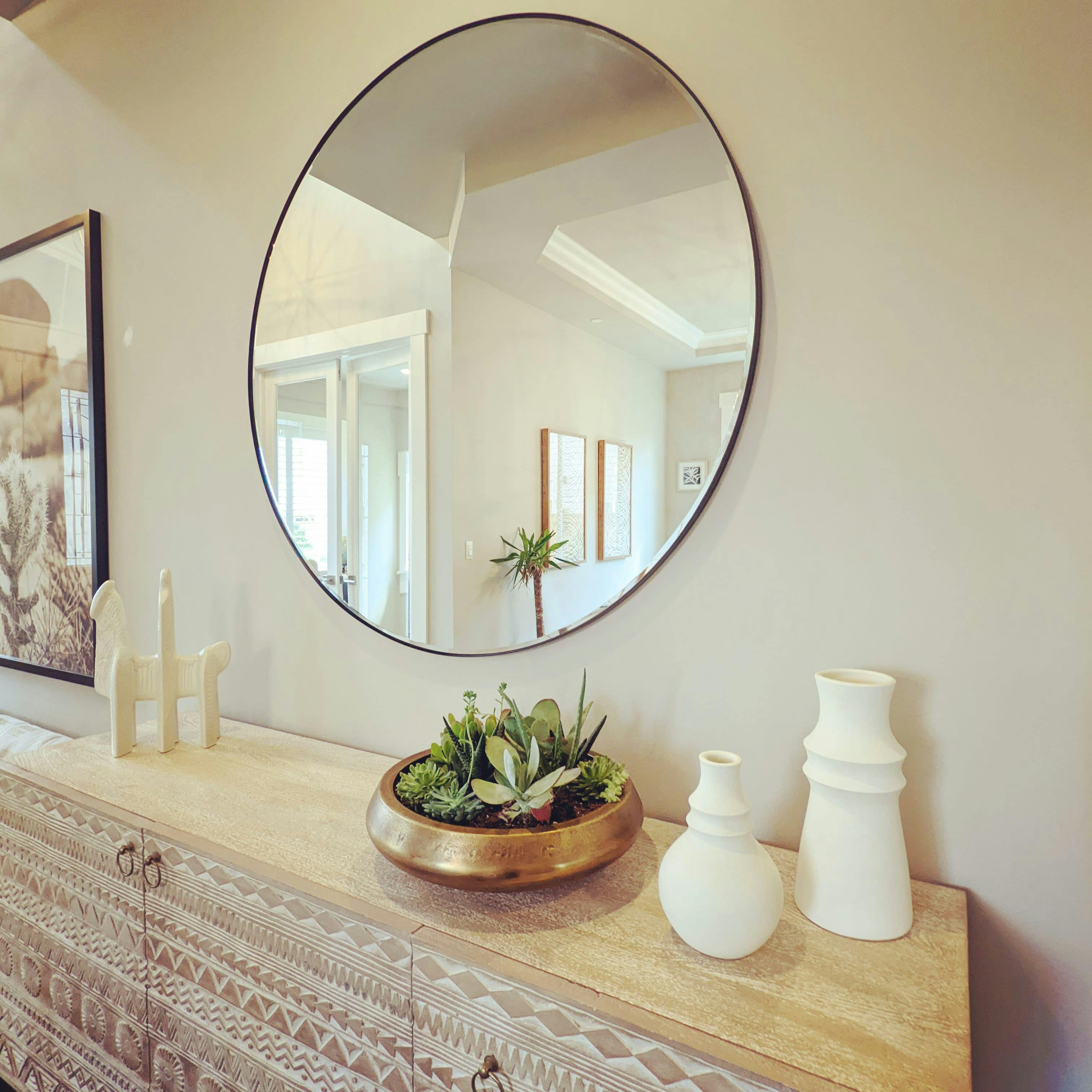 Hallway Design by Persimmon Design featuring a vintage console