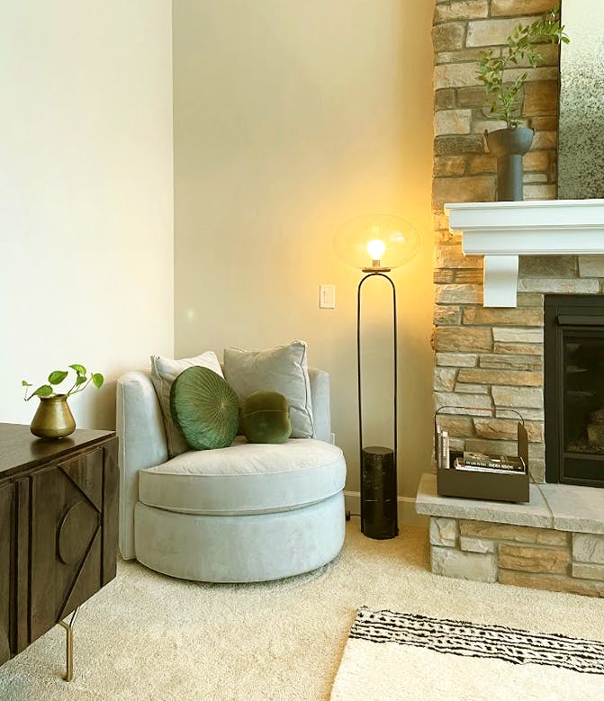 Carefully curated furniture in a Living Room designed by Persimmon Design