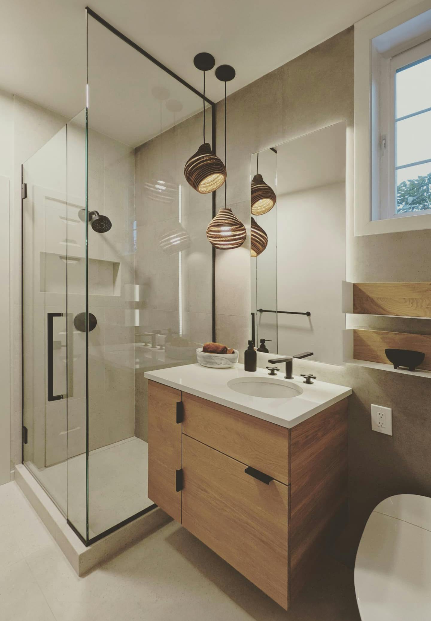 Zen Bathroom designed by Persimmon Design features natural materials and warm wood finishes.