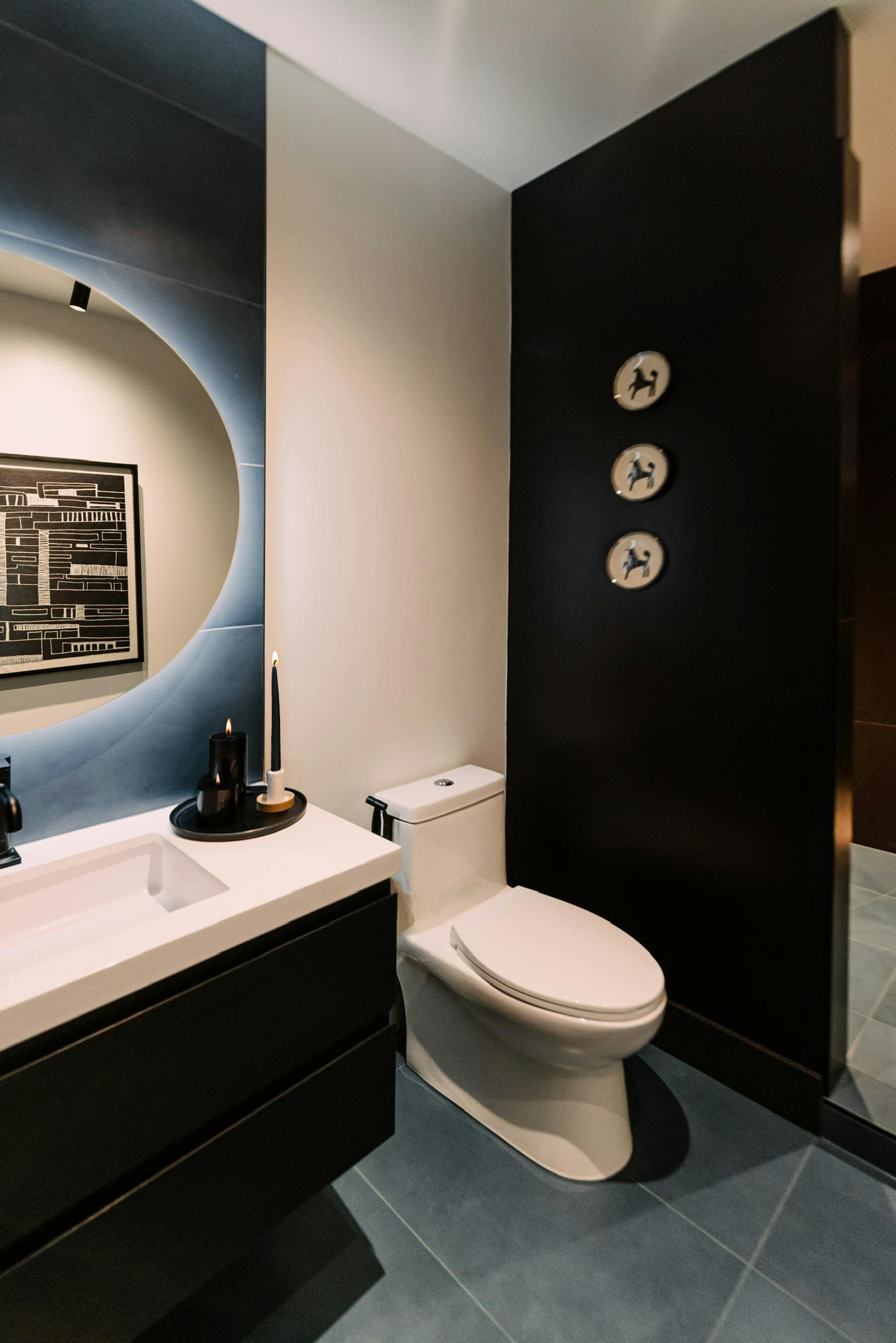 Sleek lighting highlights art, while curated greenery brings in movement and life. The result is a refined, expressive space designed for a teenager with serious style – Design by Persimmon Design