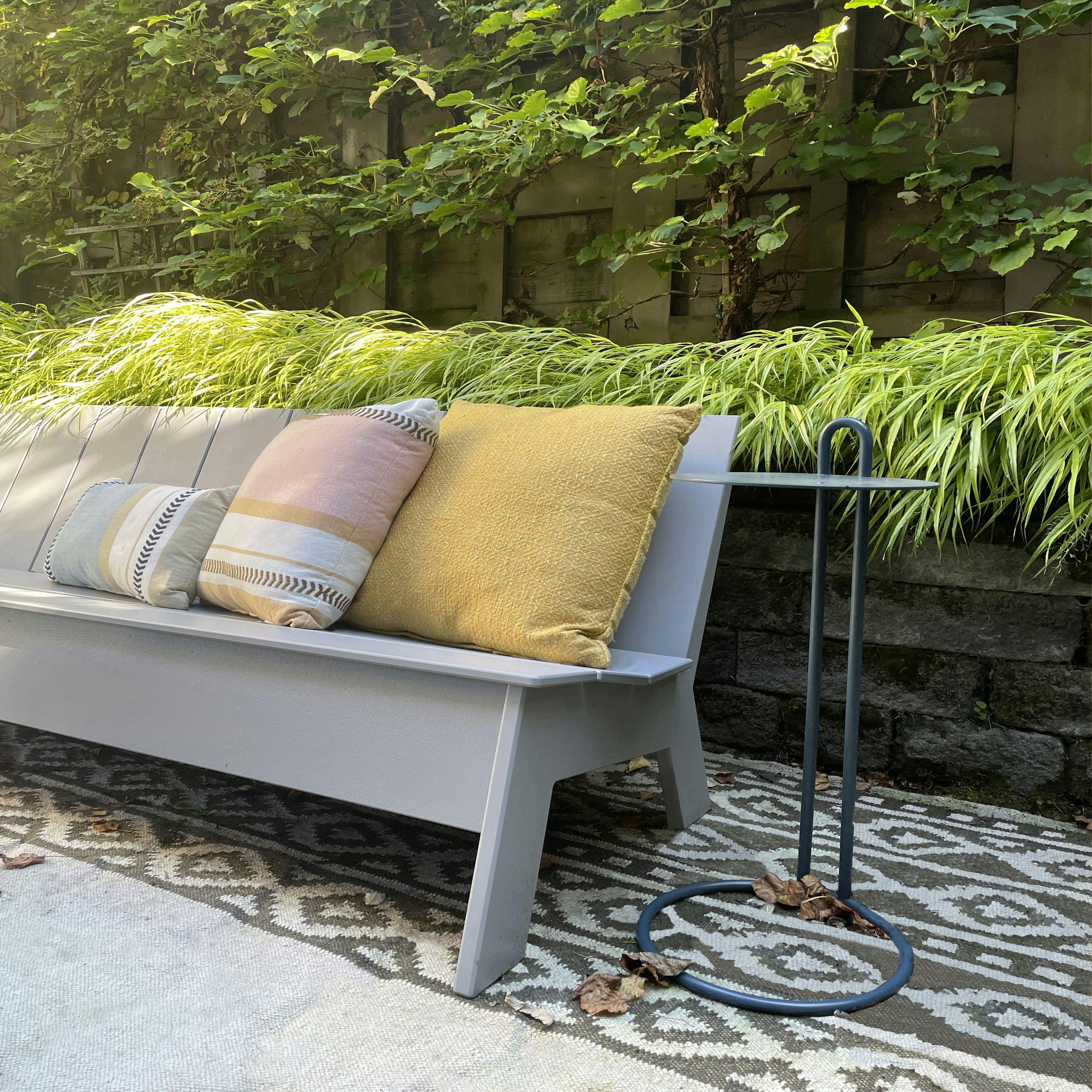 Ornamental grasses sway with a silken whisper in this Seattle garden designed by Persimmon Design