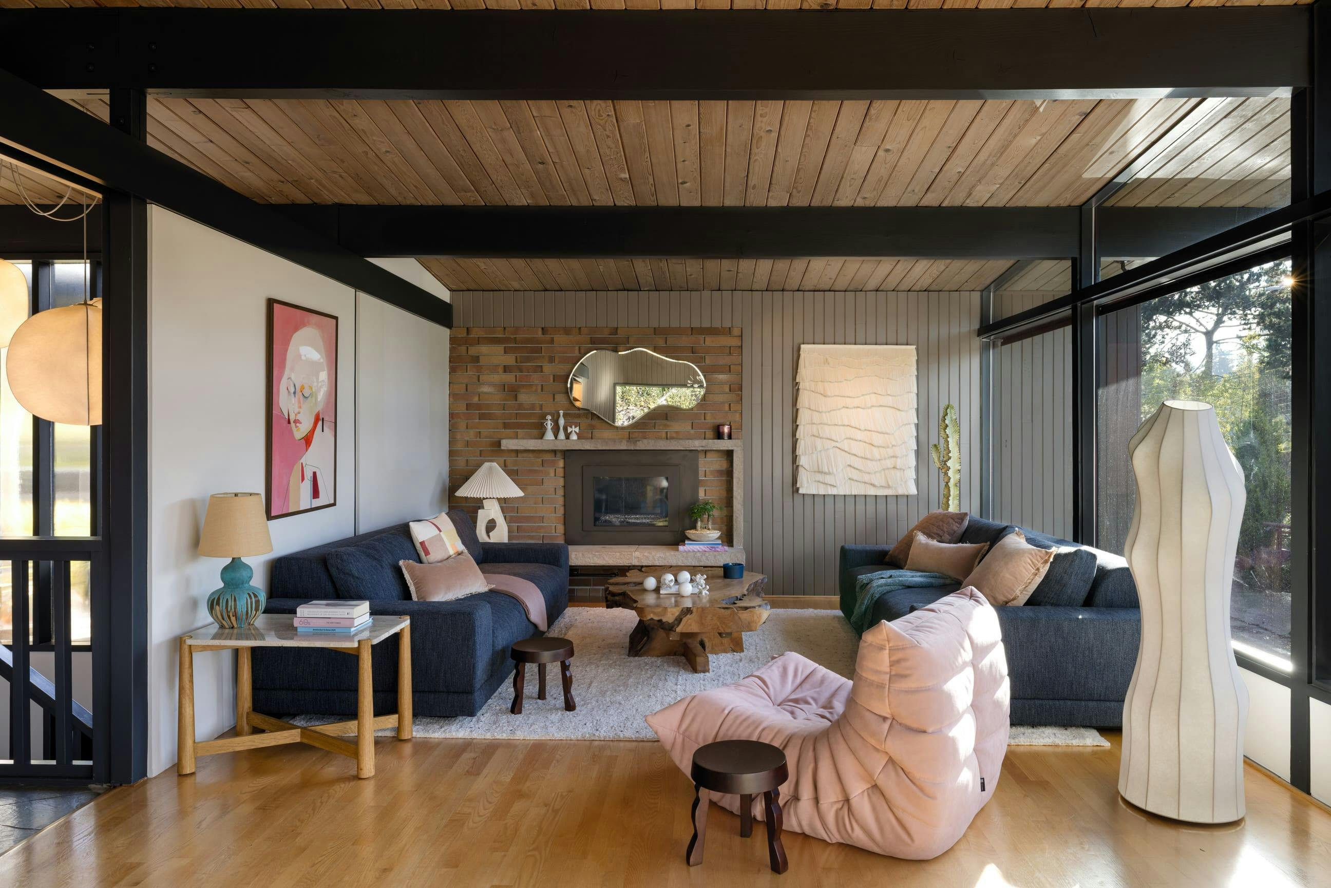 With two expansive sofas made for curling up and music drifting from speakers concealed within the walls, this family room by Persimmon Design is designed for unhurried evenings. It’s in these quiet, considered details that a home begins to feel complete.  Photo courtesy: Miranda Estes Photography
