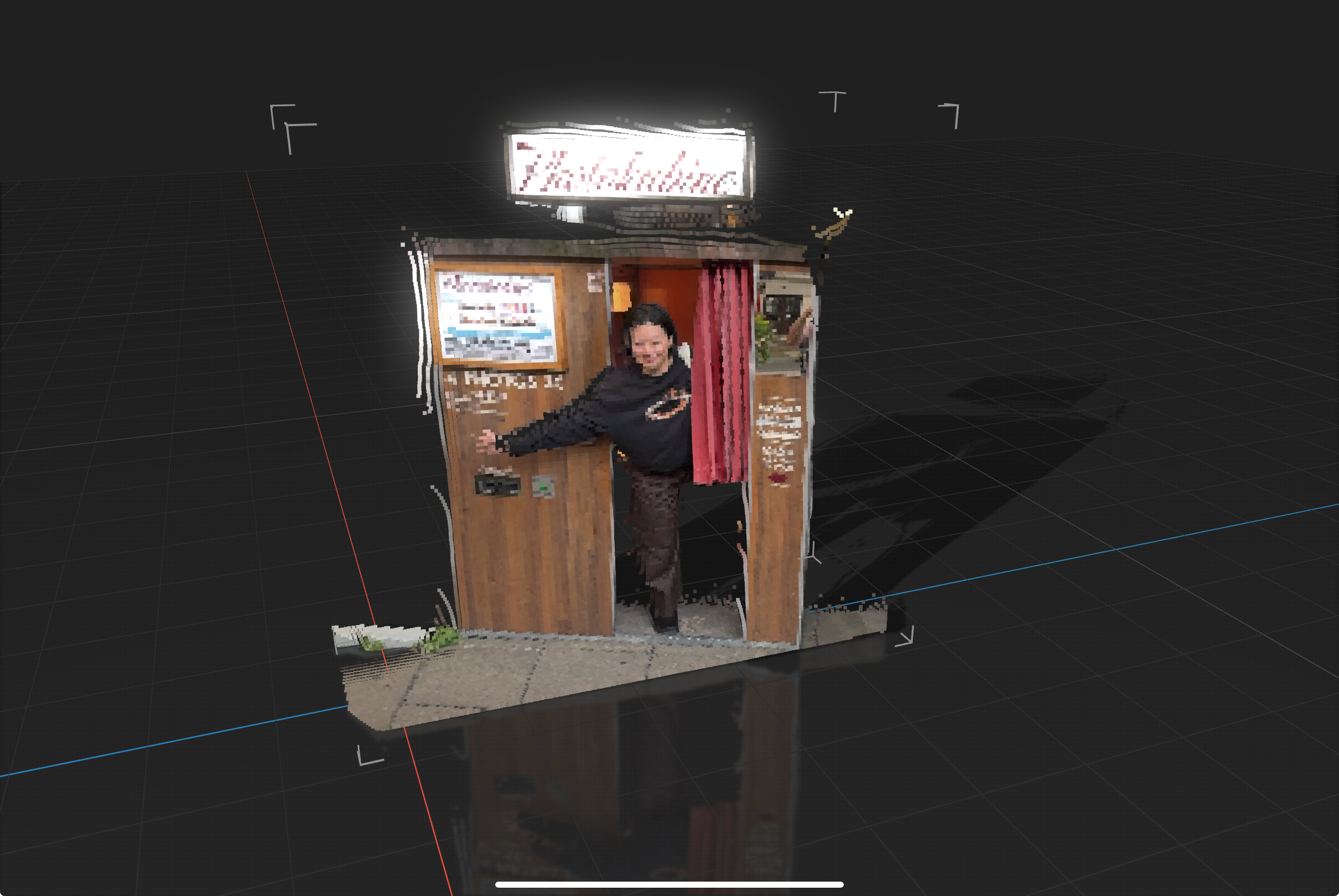 Point Cloud rendering of a woman in a photo booth.
