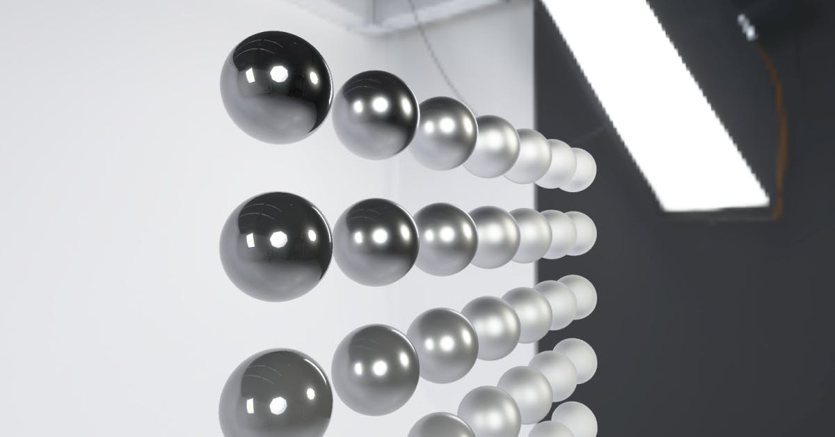 Screenshots of rendered spheres demonstrating roughness and metallic parameters in Physically Based Rendering