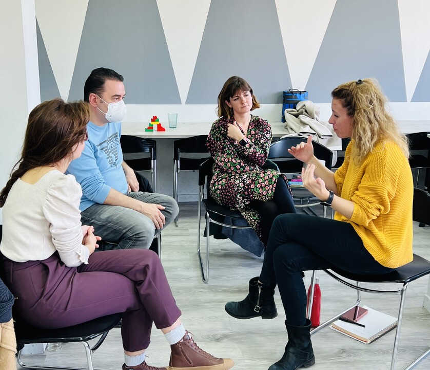 A group of school professionals debating