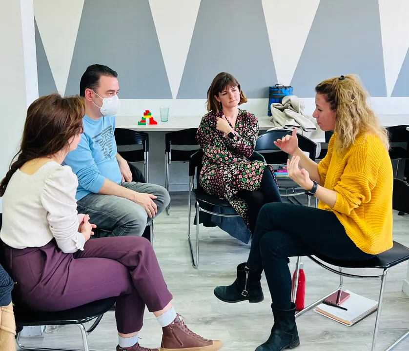 A group of school professionals debating