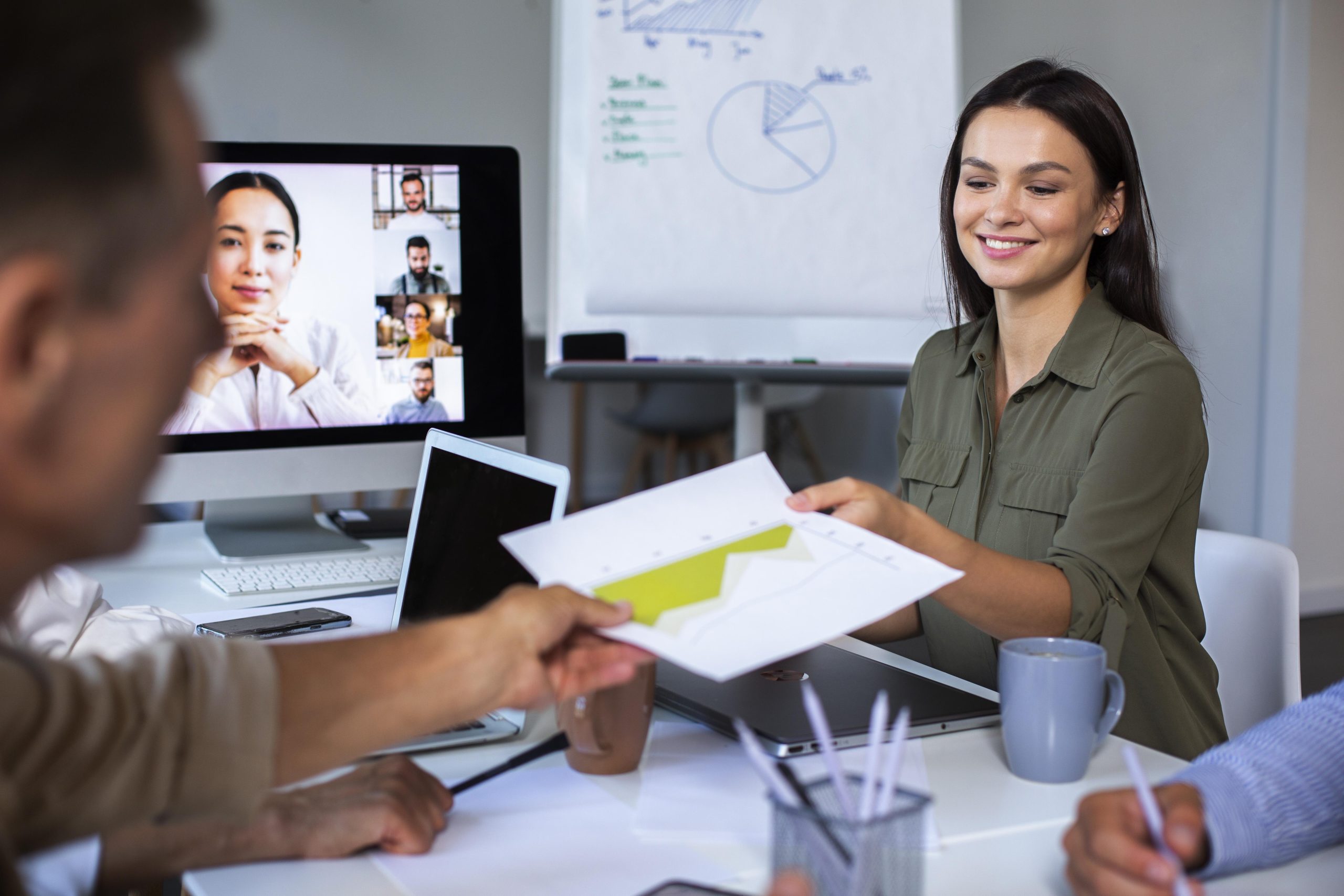 Professionals using digital devices whilst working