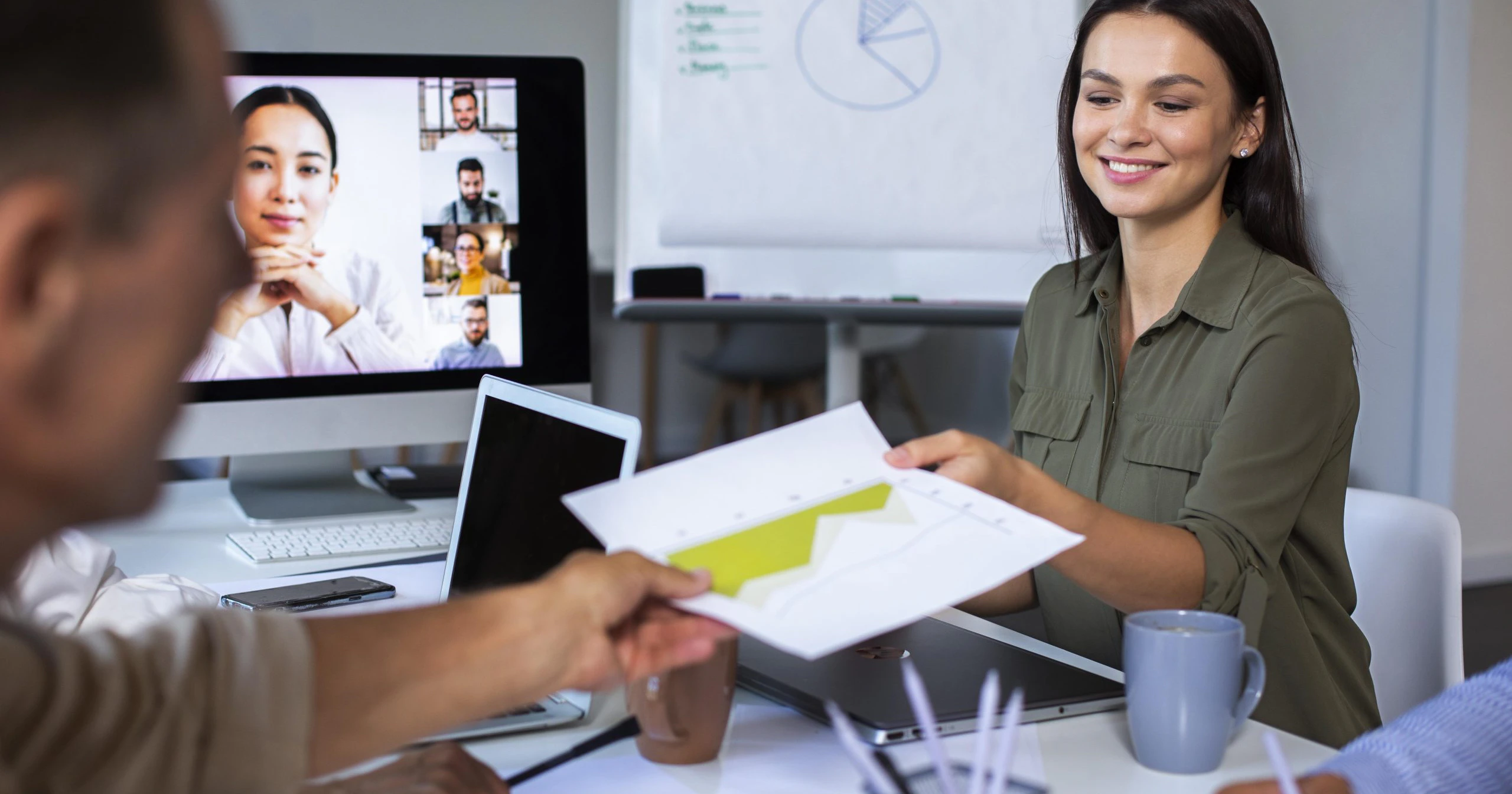 Professionals using digital devices whilst working
