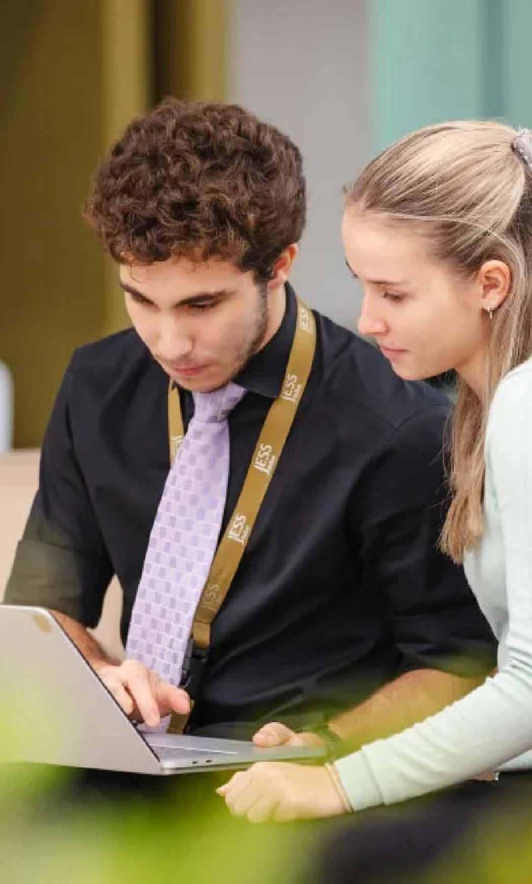 Students working together on a laptop