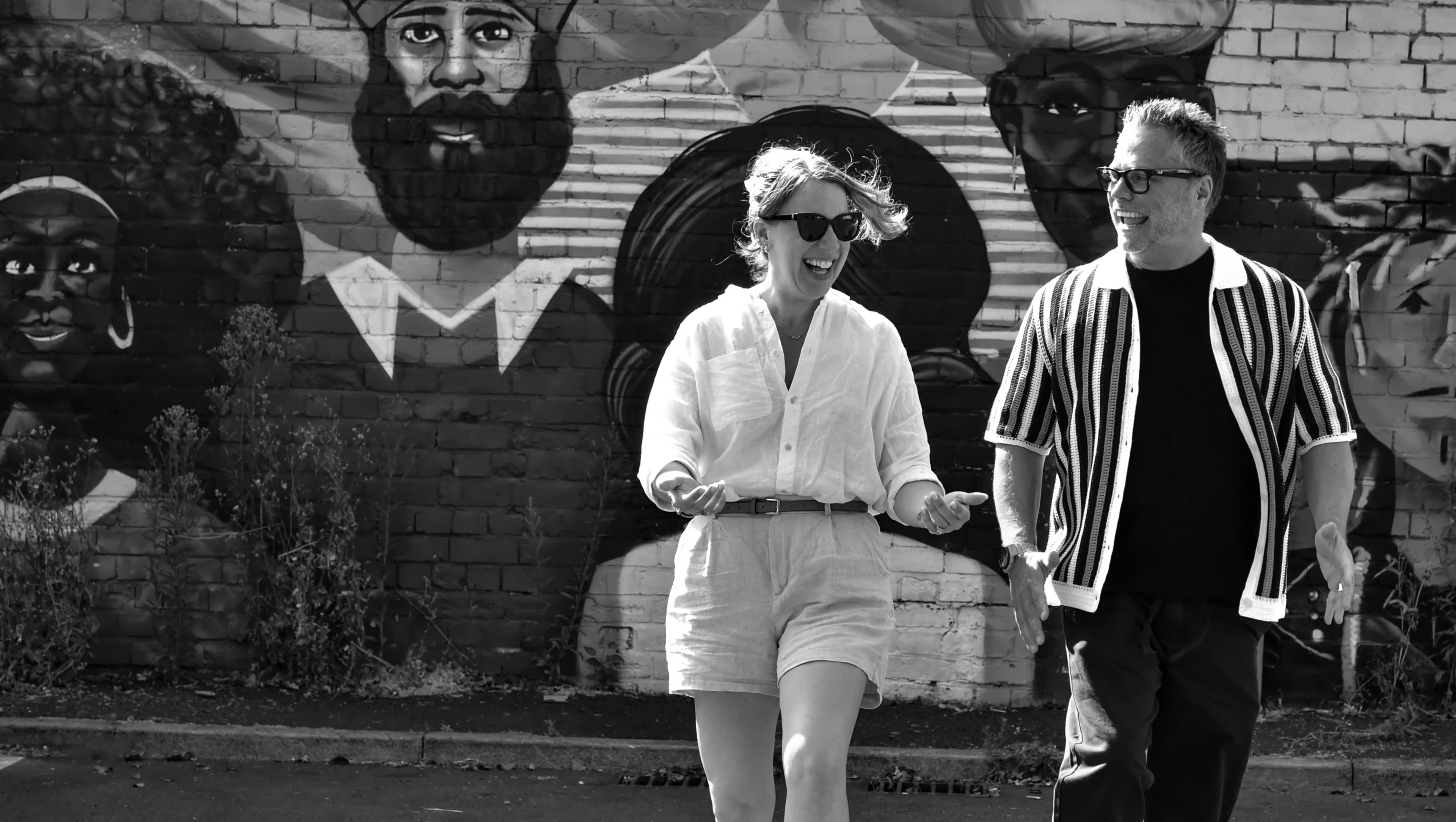 Nick and Lydia walking and laughing