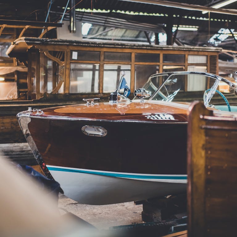 Riva boats for sale, bow of Riva Ariston in the workshop at Peter Freebody & Co, Hurley
