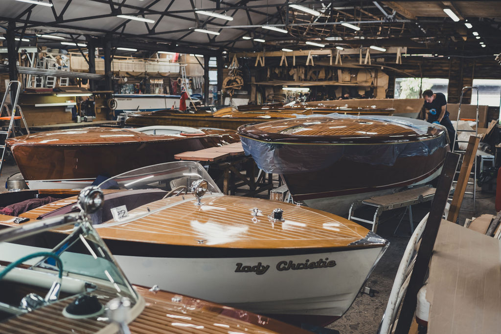 Riva boats for sale, Rivas and other launches undergoing restoration in the workshops at Peter Freebody & Co 
