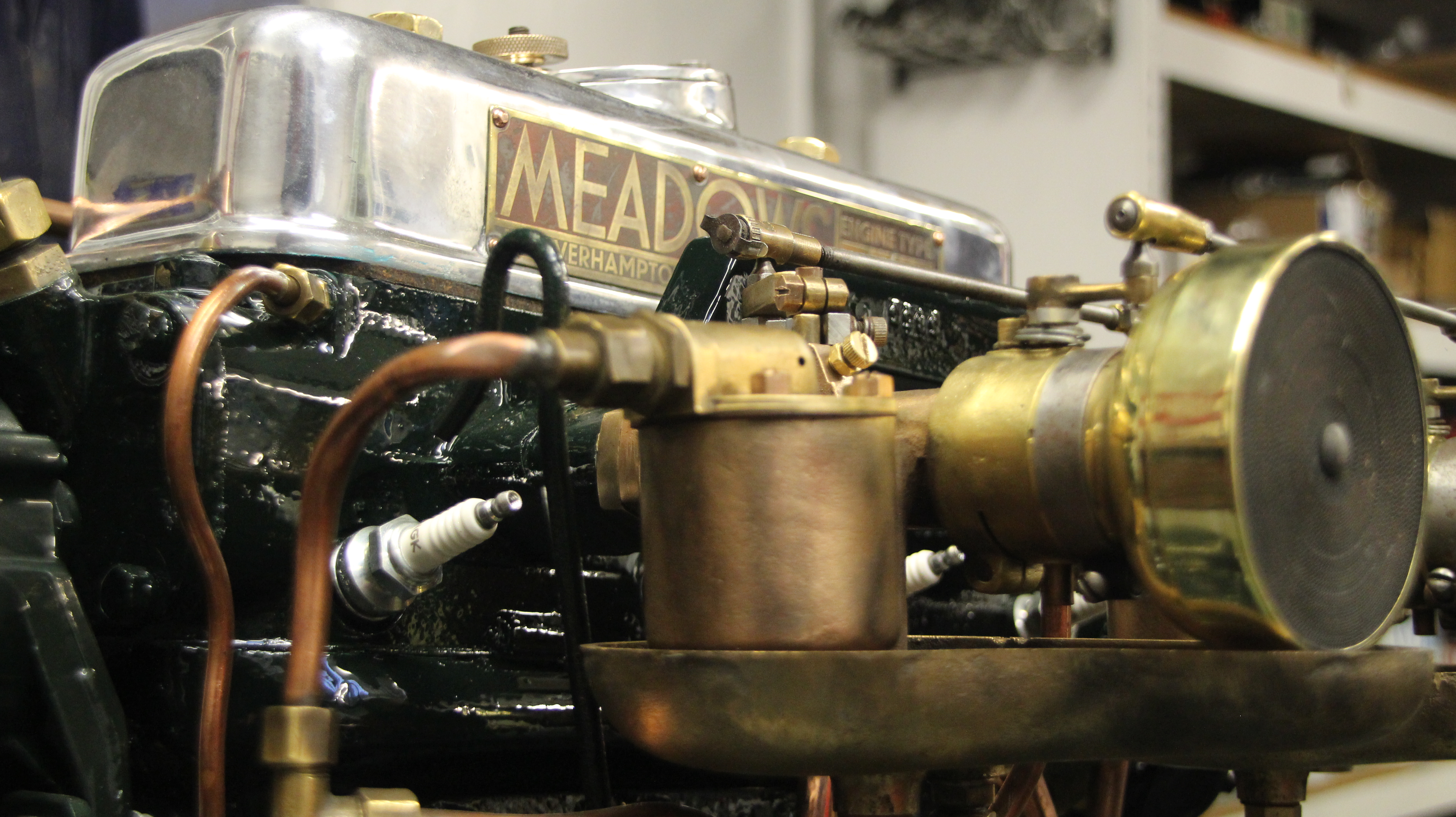 Wooden boat restoration, early Meadows marine petrol engine in Freebody engineering workshop