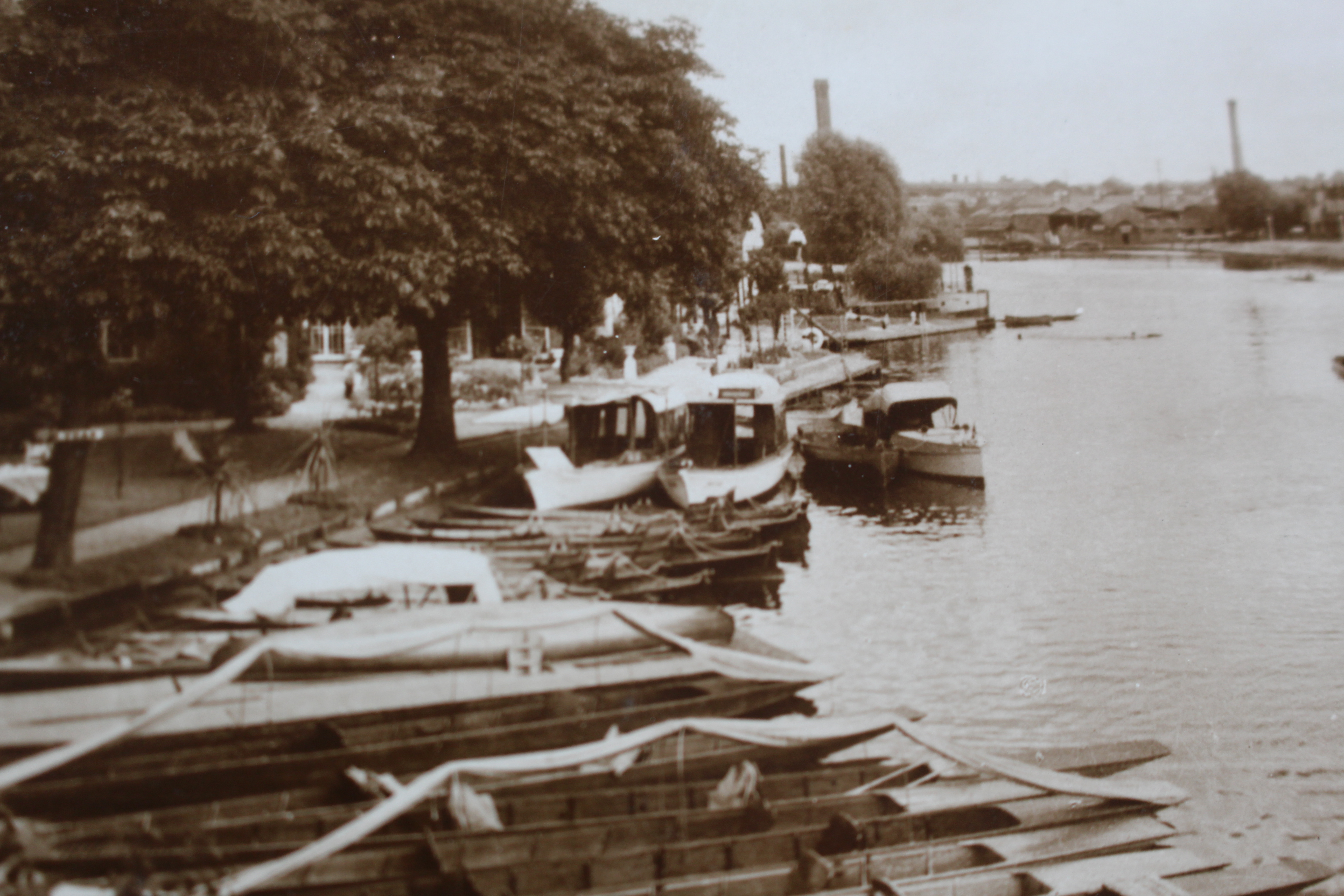 Traditional wooden boats, black & white river view of Freebody's boatyard Caversham 