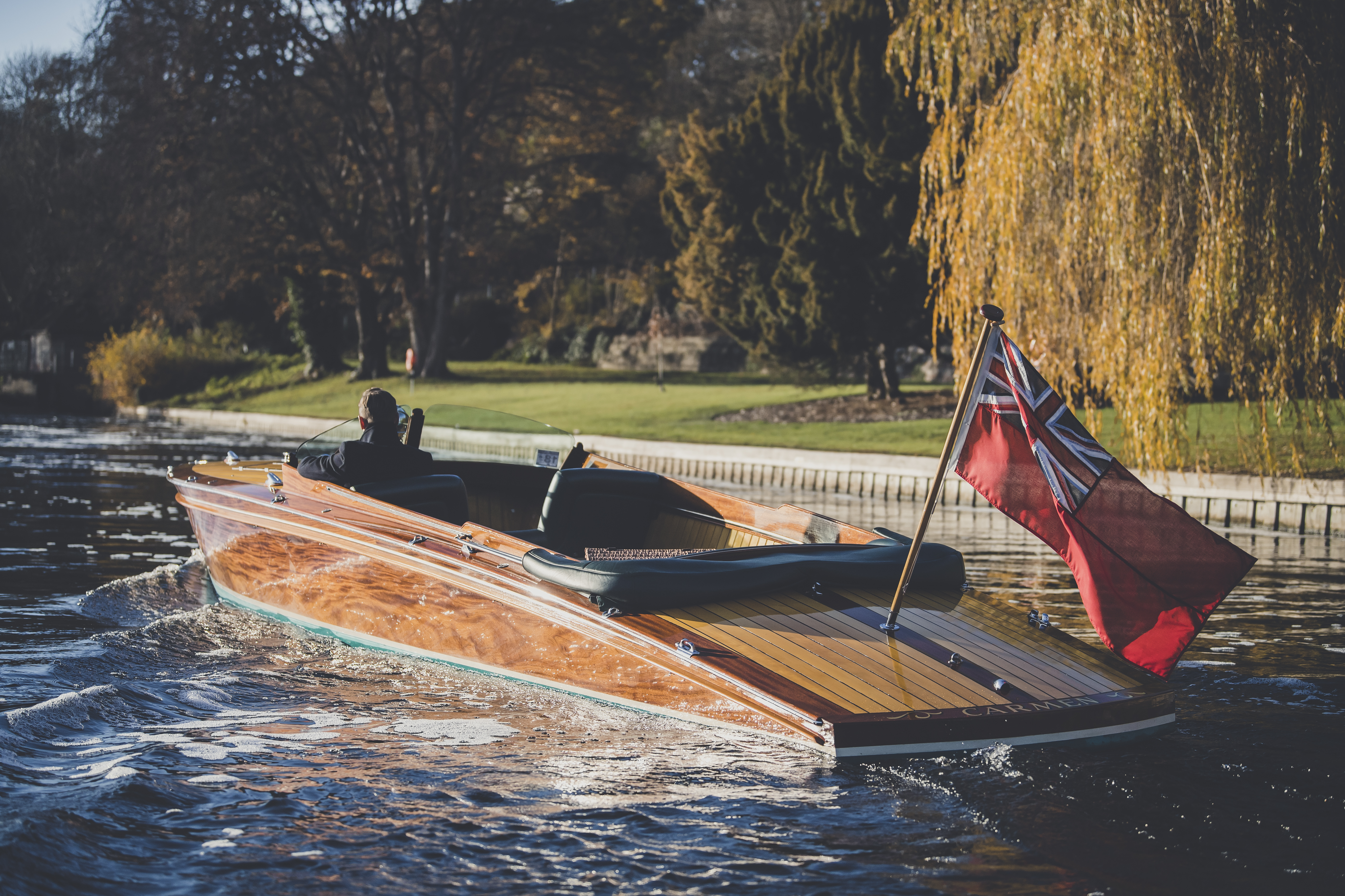 Slipper launch for sale, Freebody Slipstream slipper launch on river with flag flying