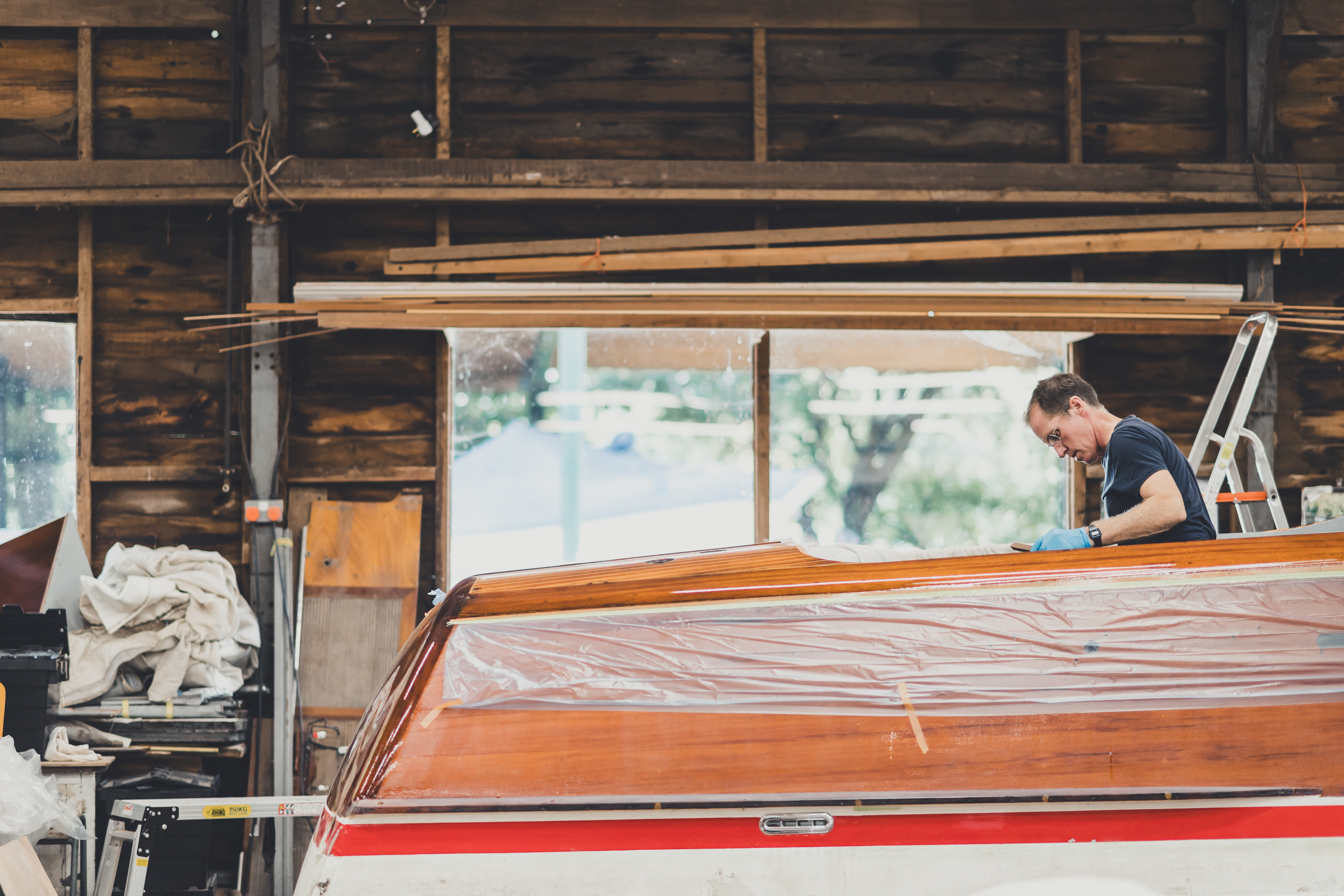 Riva boats for sale, boatbuilder at Peter Freebody & Co restoring Riva Aquarama in Hurley workshop