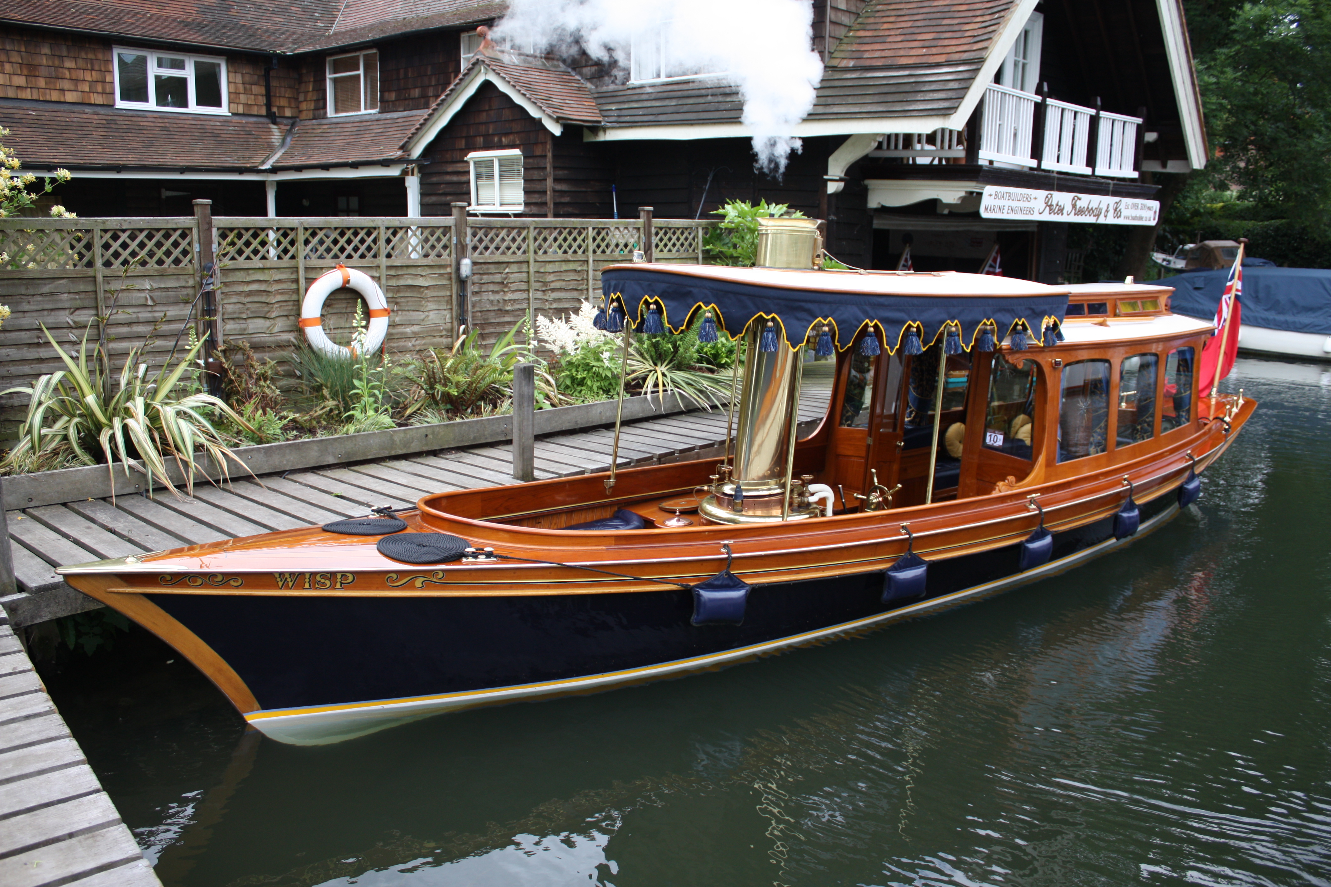 Steam launch for sale, moored up at Freebody's boatyard