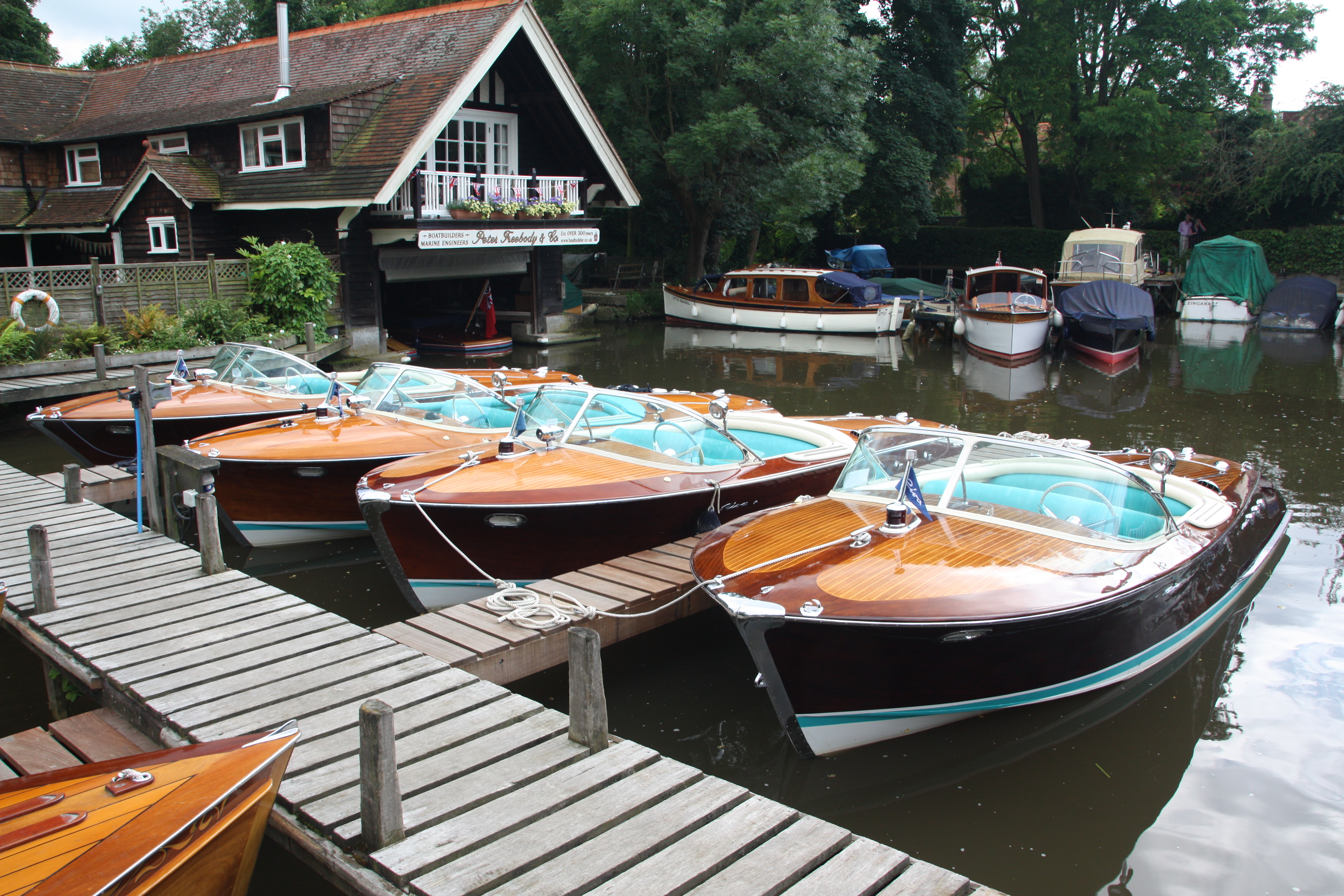 Riva boats for sale, Rivas afloat on the moorings at Peter Freebody & Co Hurley