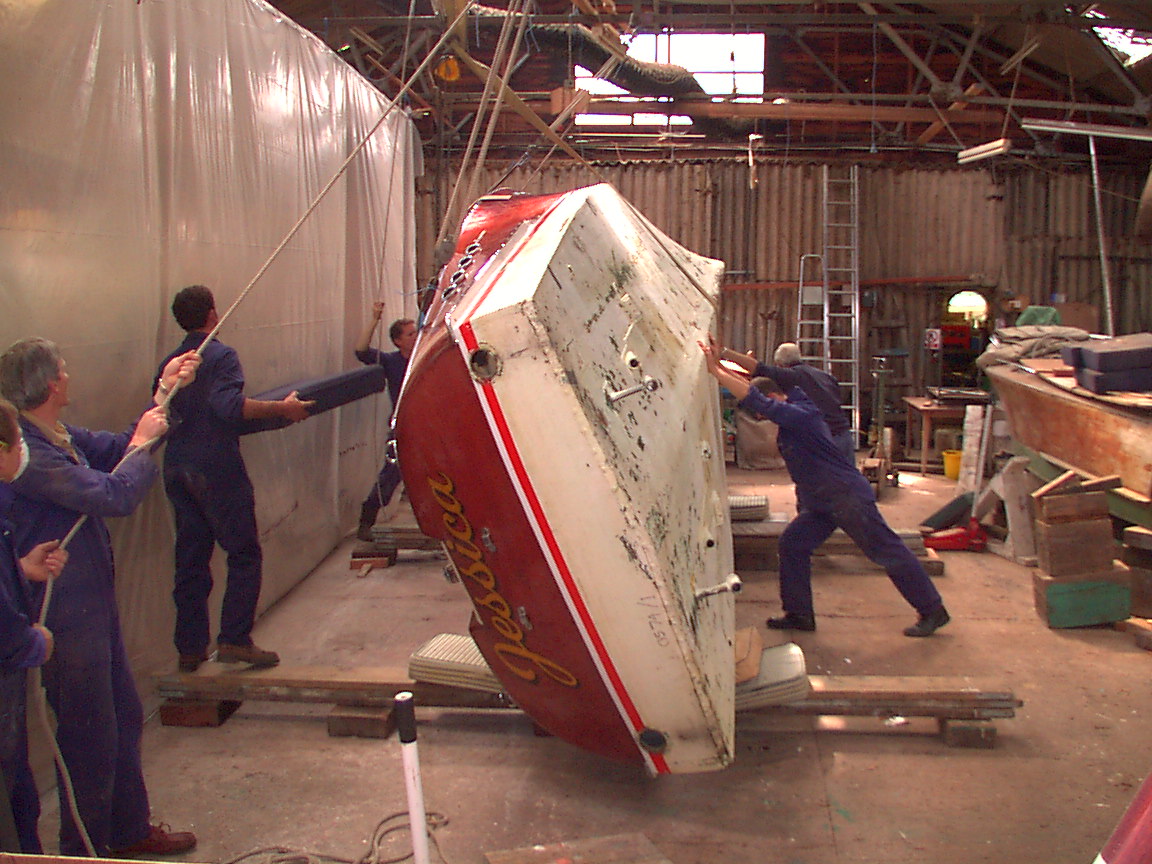 Riva boats for sale, Riva Aquarama being turned over for restoration in Peter Freebody & Co workshop