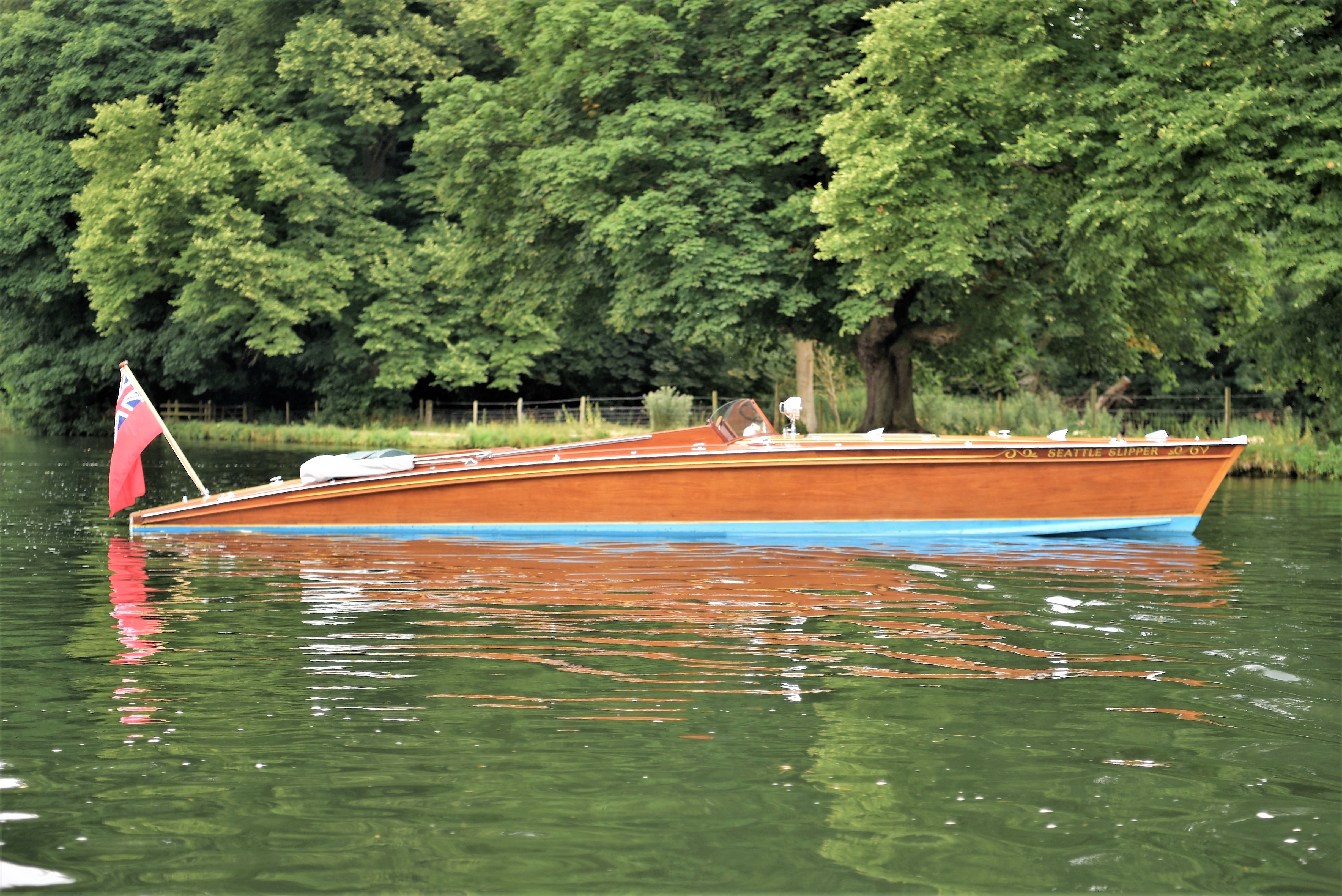 Slipper launch for sale, side profile view 