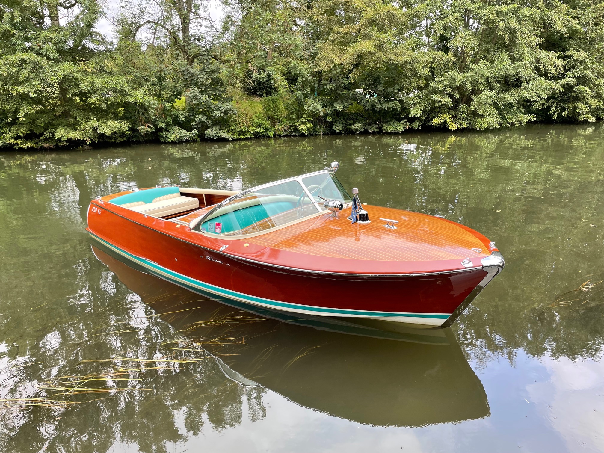 Riva Super Florida for sale, view from side, afloat on river Thames