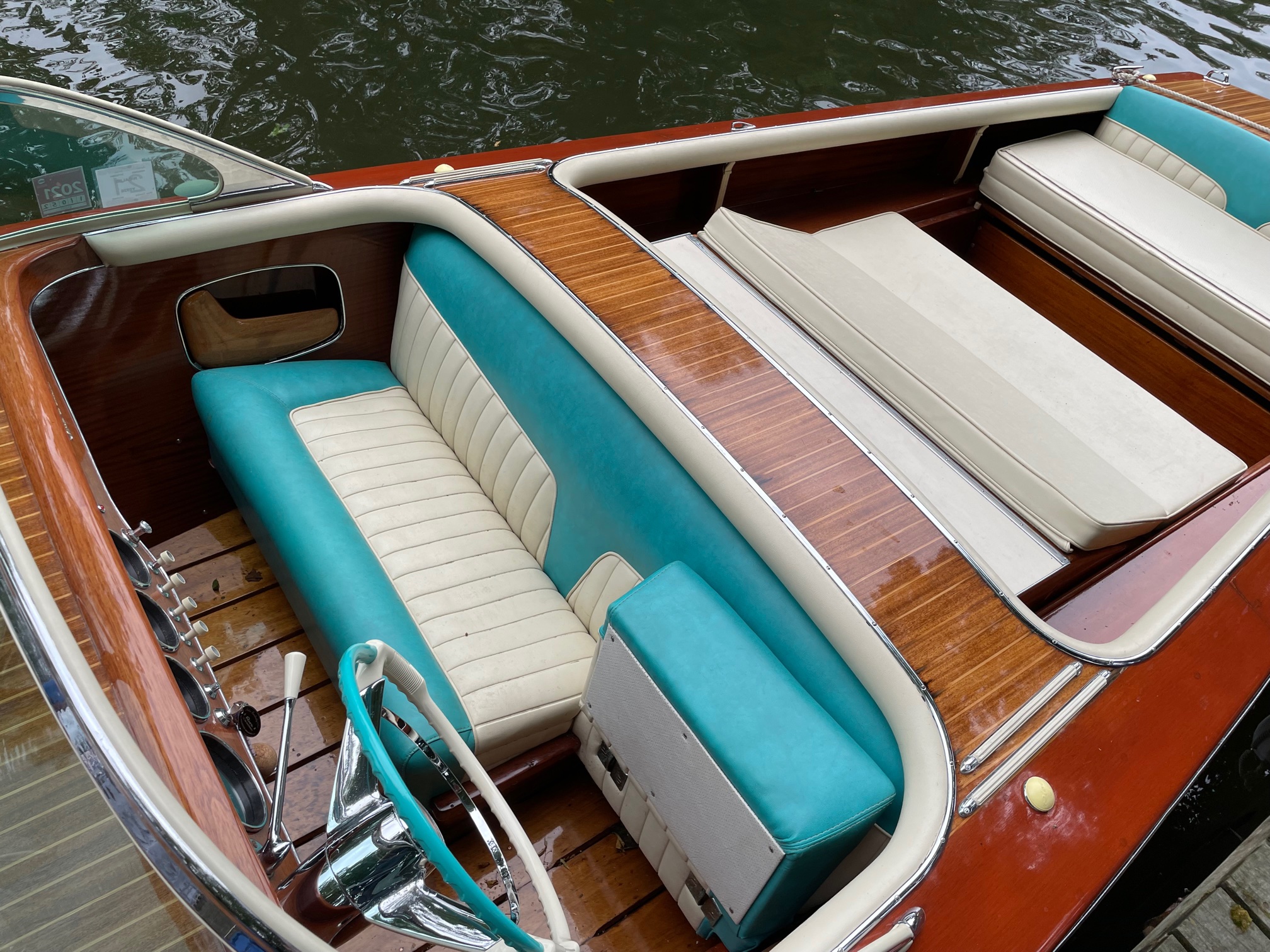 Riva Super Florida for sale, overview of interior showing classic Riva turquoise and ivory upholstery