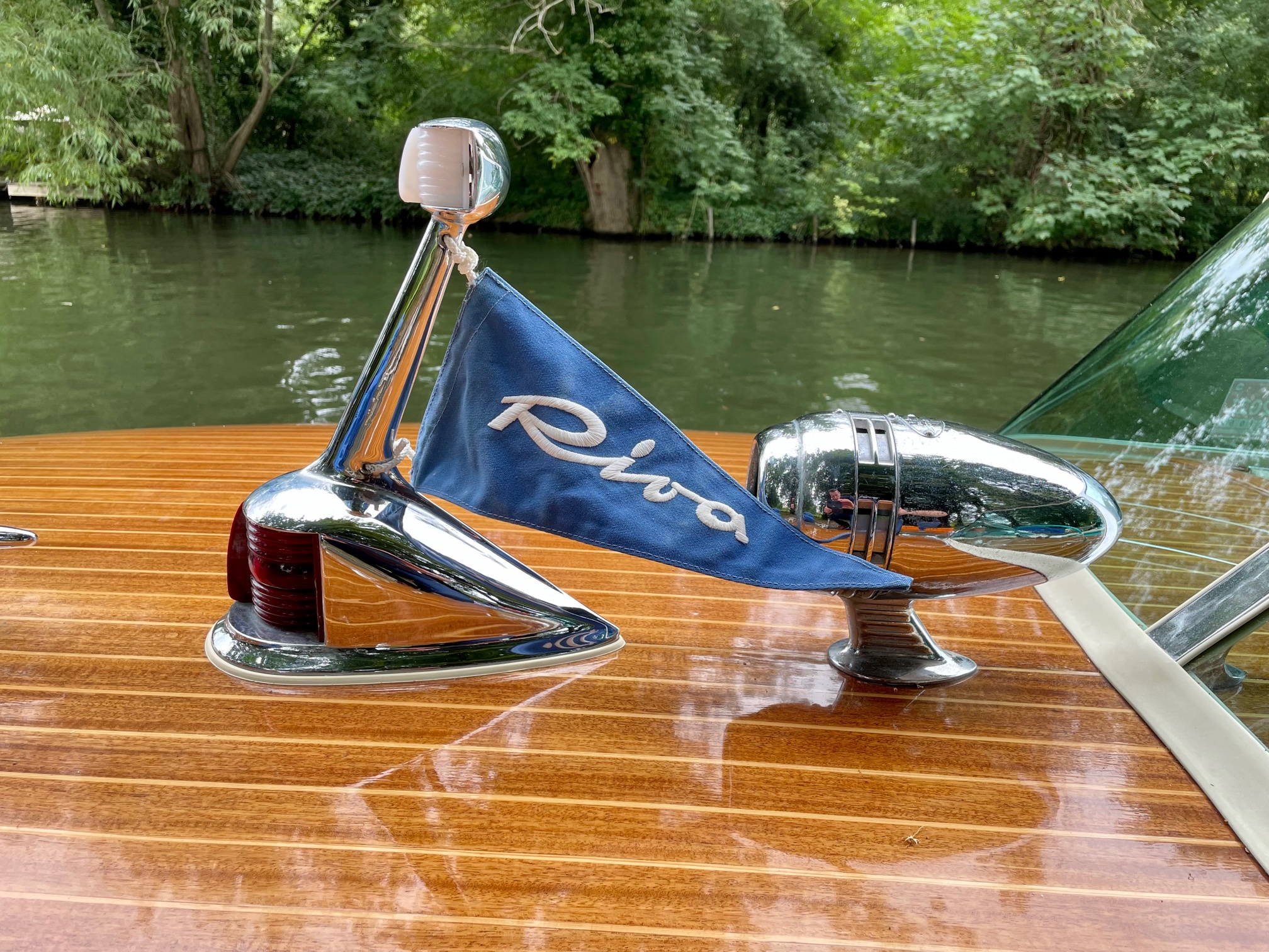 Riva Super Florida for sale, detail showing Riva pennant on forward deck 