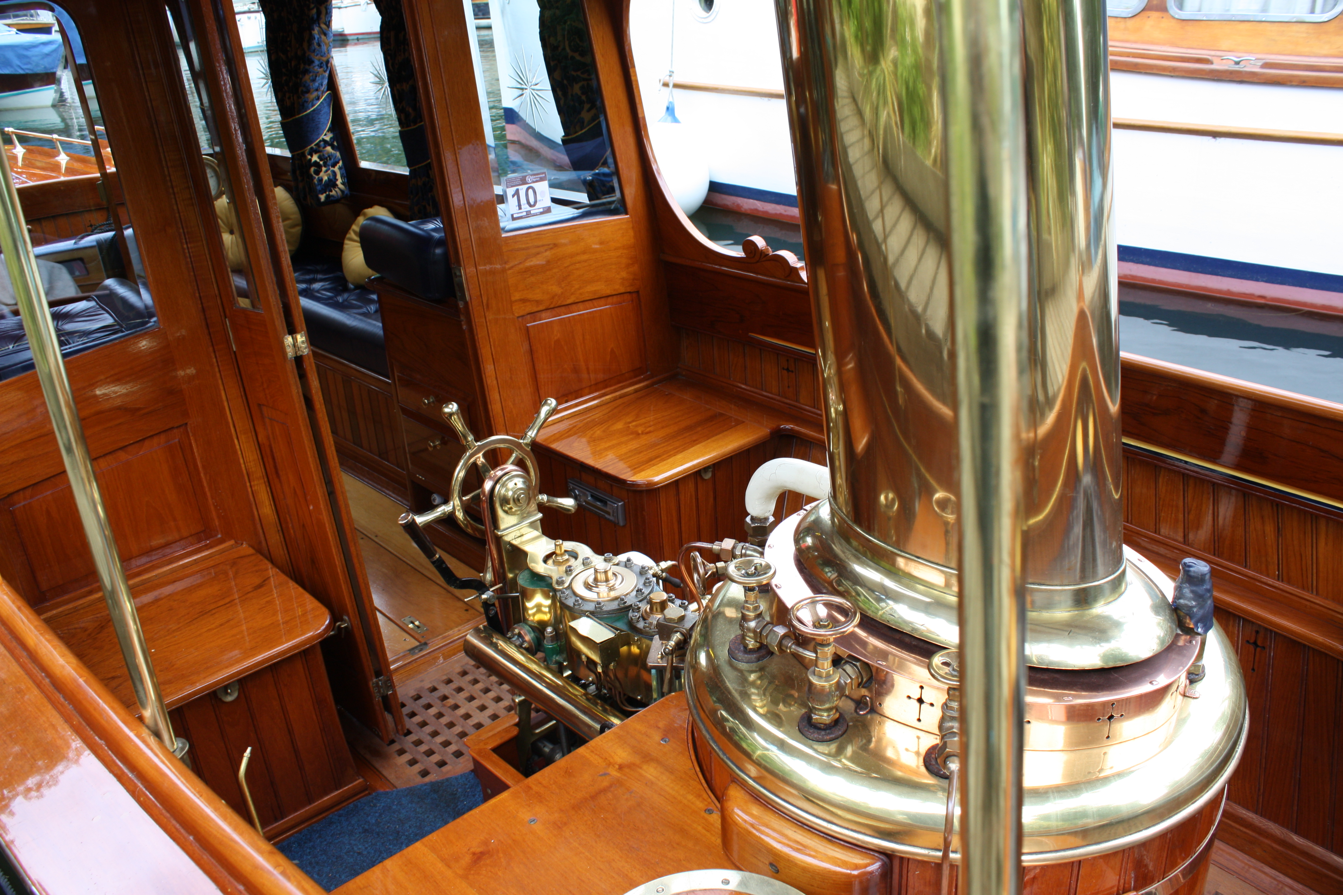 Steam launch for sale, forward cockpit with funnel and steam engine