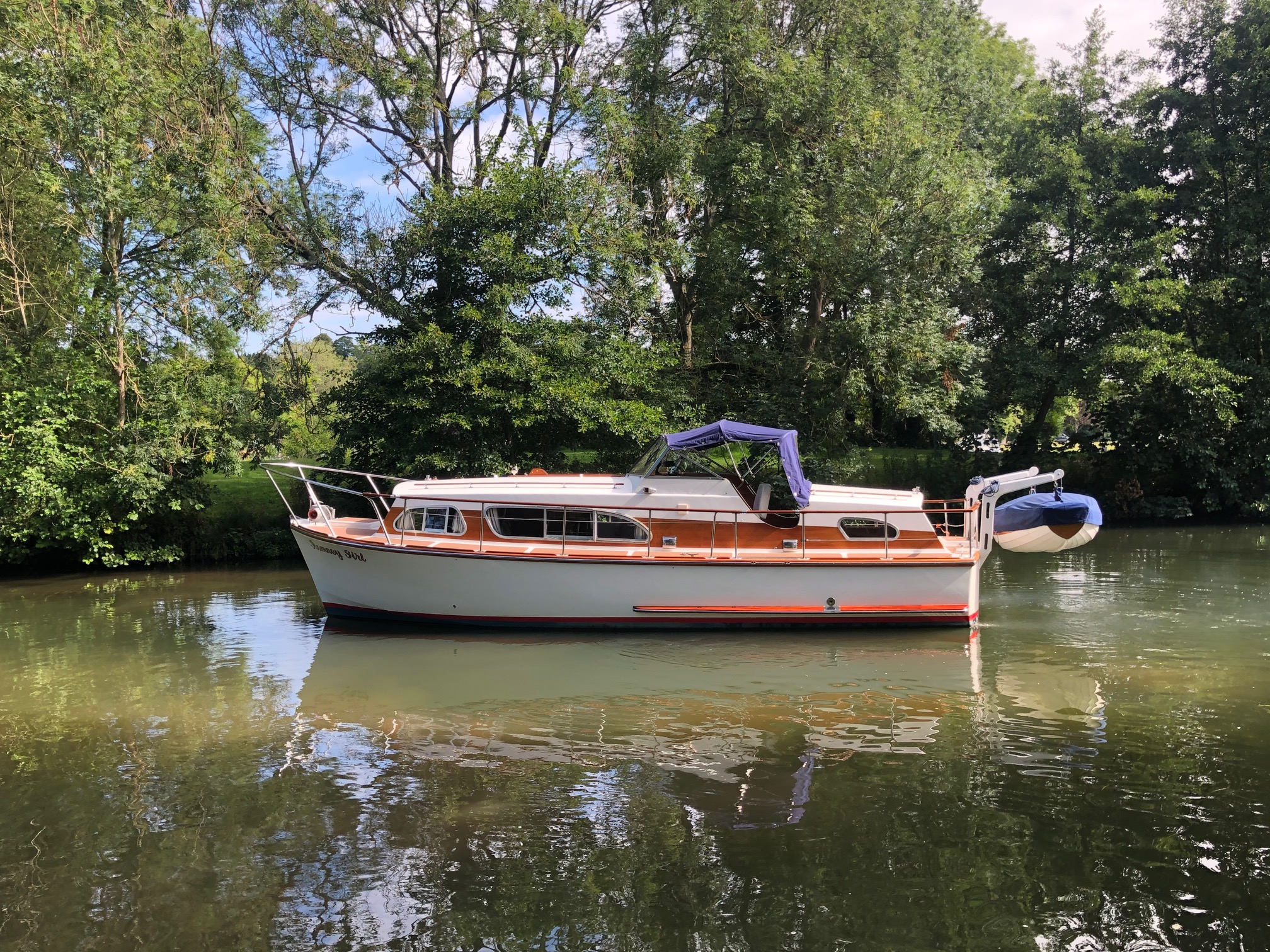 30ft cabin cruiser side view afloat river Thames