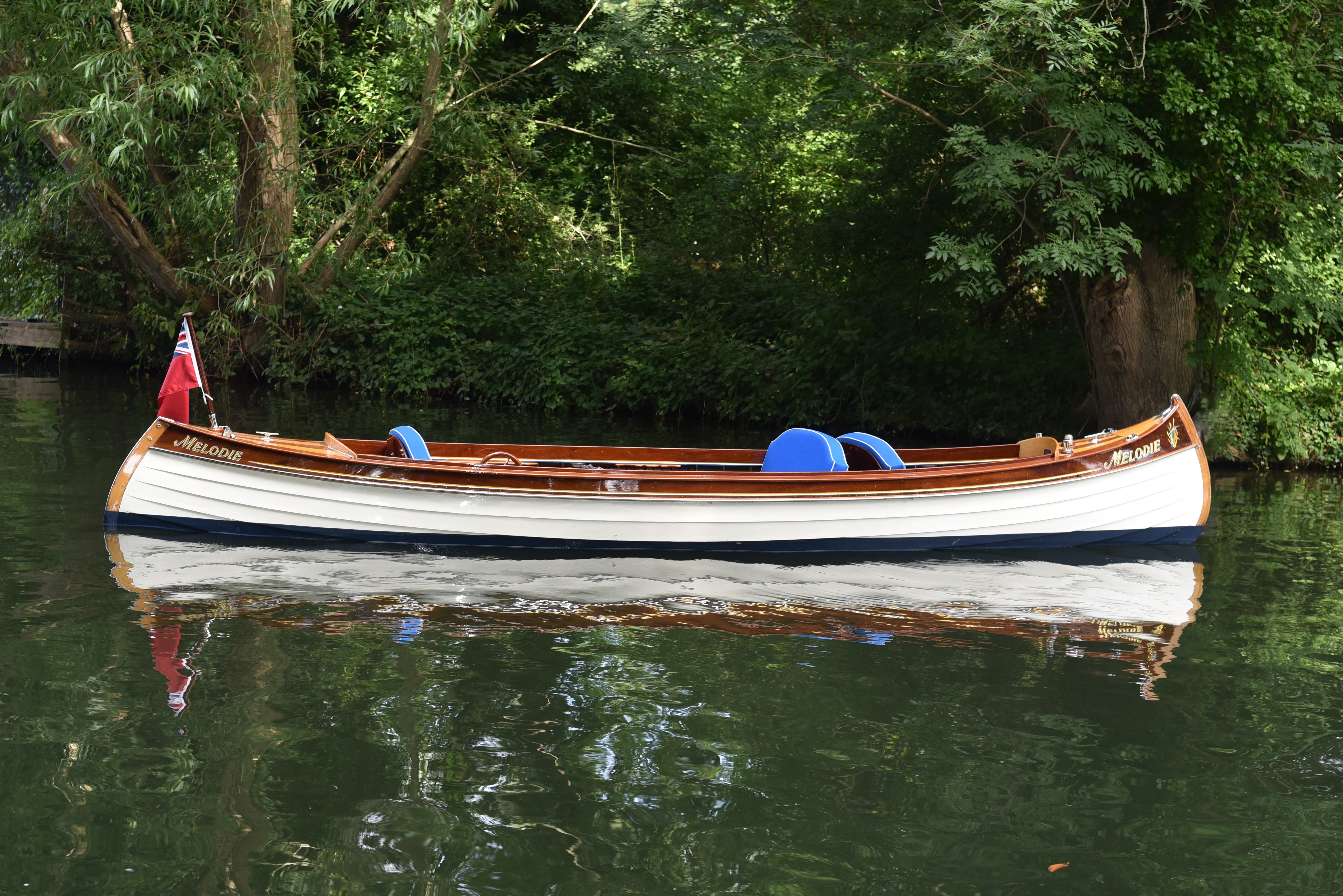 20ft electric launch for sale near Henley-on-Thames, side profile afloat on river Thames