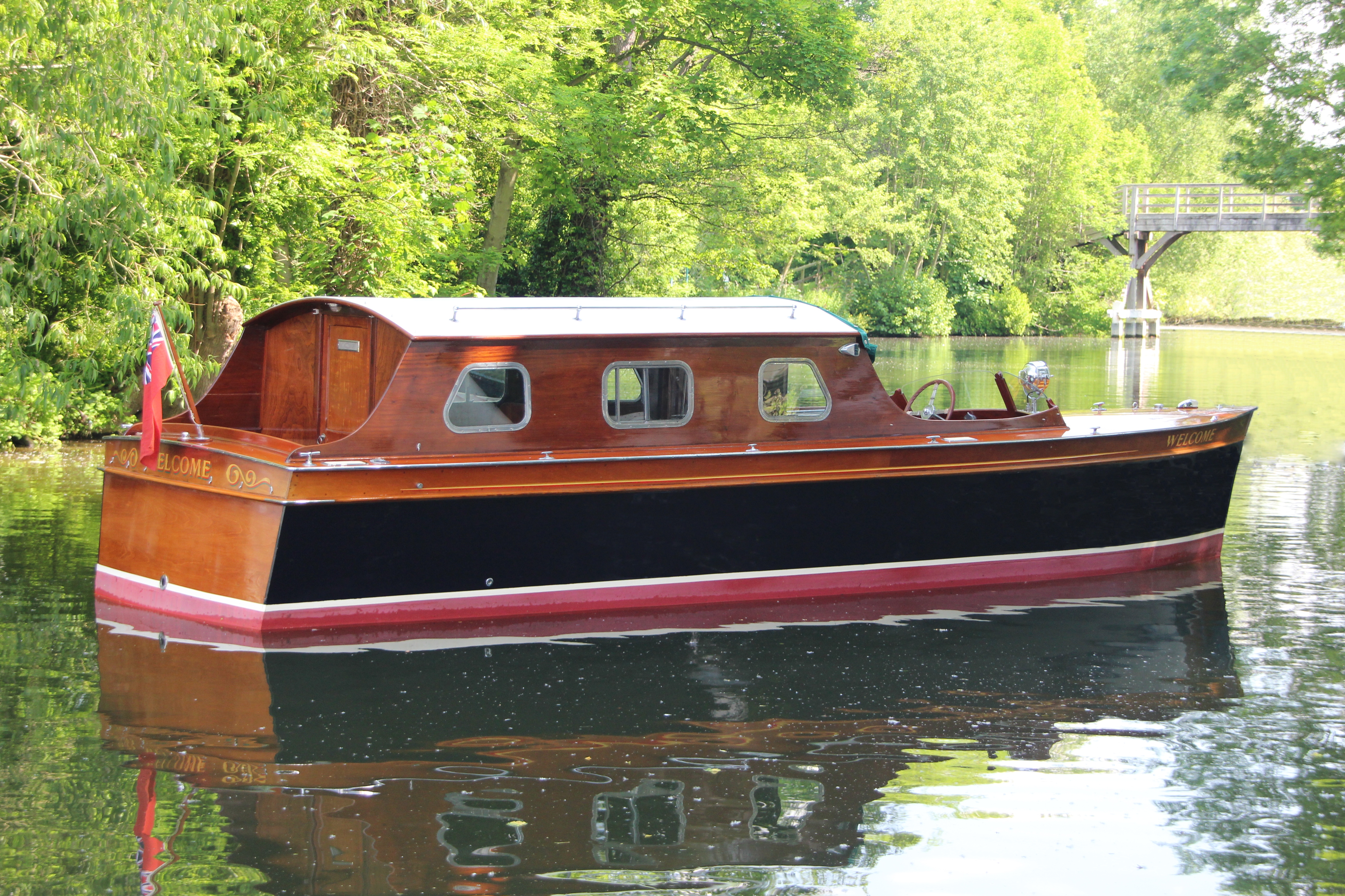 Andrews Day Launch for sale, starboard side profile afloat on river Thames 