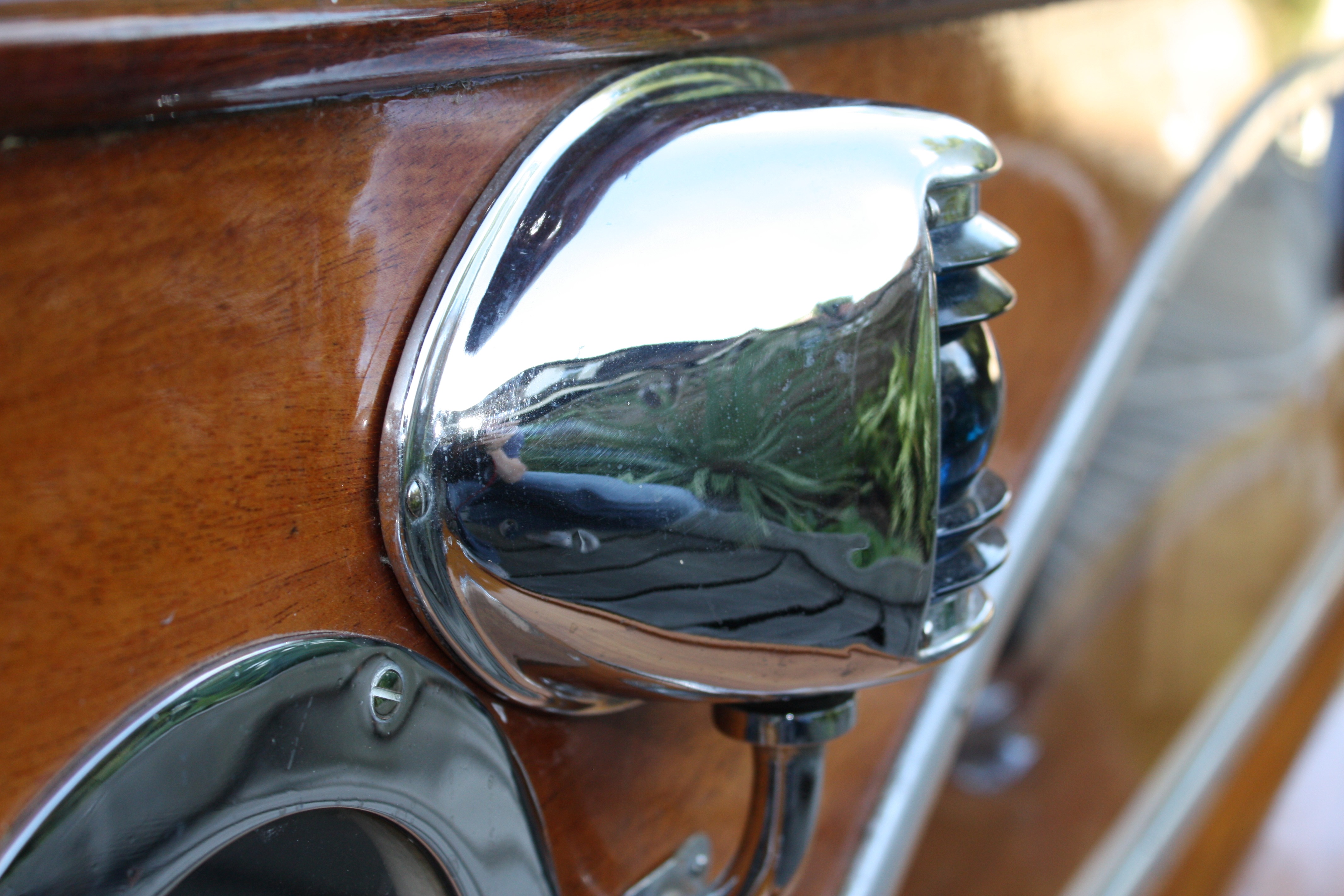 Cabin cruiser for sale, detail showing chrome navigation light