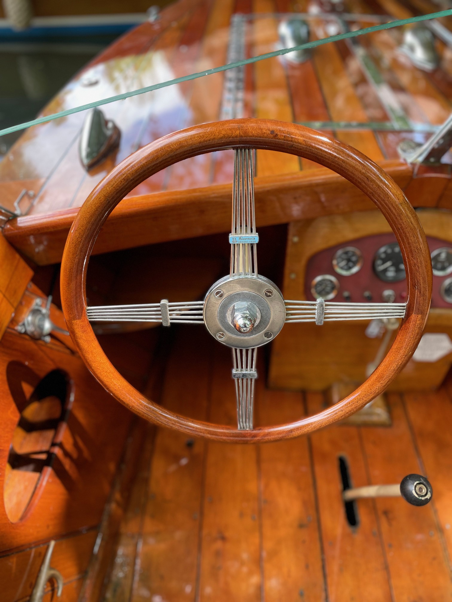 Slipper launch for sale, detail showing steering wheel and helm