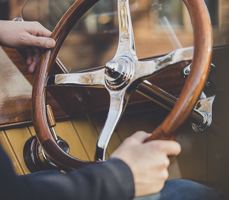 Luxury wooden boats for sale, detail showing Freebody slipper launch wooden steering wheel rim 