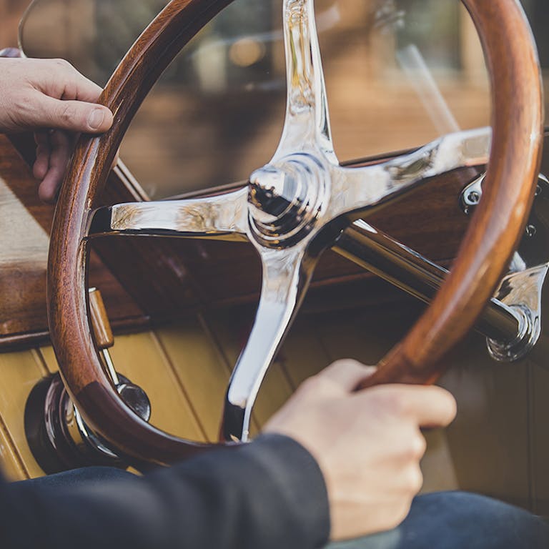 Luxury wooden boats for sale, detail showing Freebody slipper launch wooden steering wheel rim